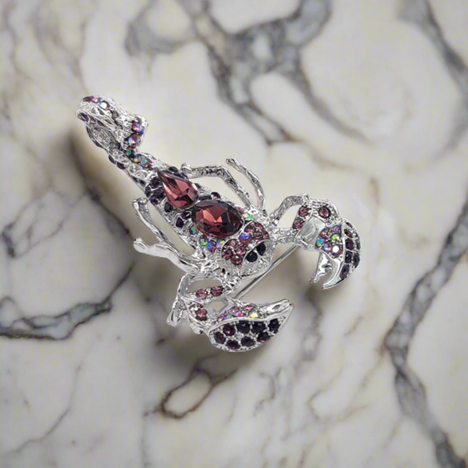 Styled image of a gemstone animal lapel pin attached to a blazer, highlighting its luxurious appearance