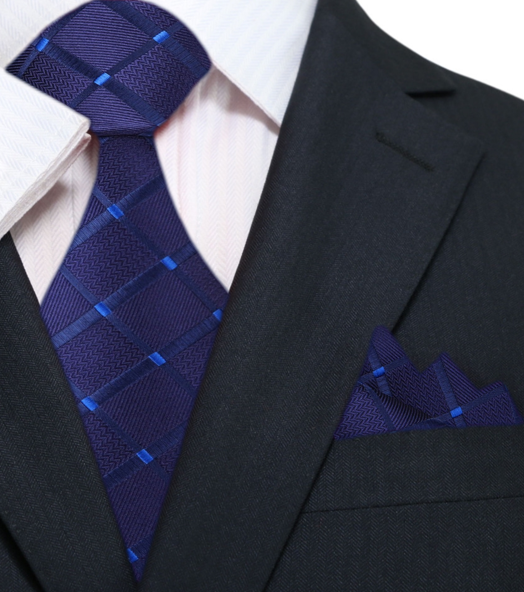 Man wearing the navy blue geometric tie with a white dress shirt