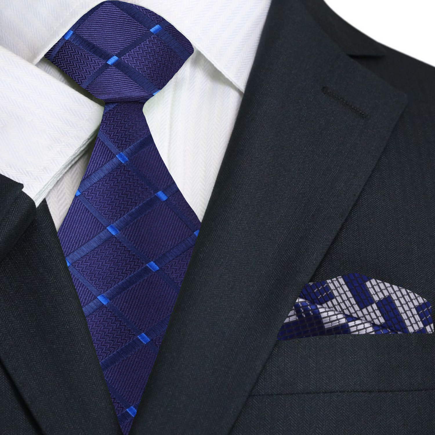 Man wearing the navy blue geometric tie with a white dress shirt