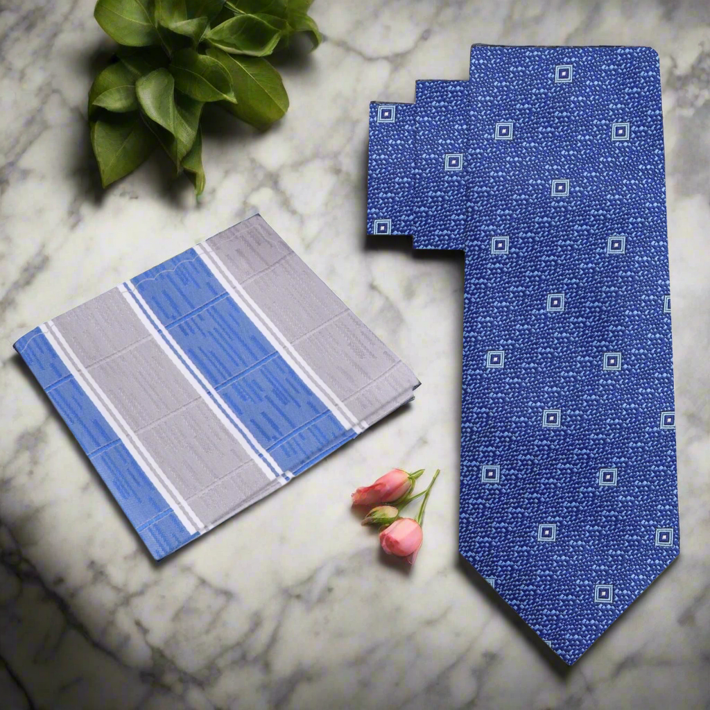 Close-up of blue geometric silk necktie with medallion pattern, ideal for formal events