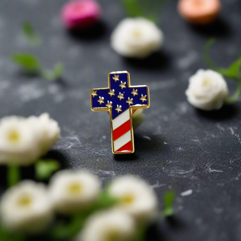 Close-up of a cross lapel pin showing detailed zinc alloy craftsmanship