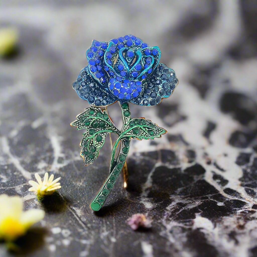 Rose-shaped lapel pin displayed against a wedding suit.