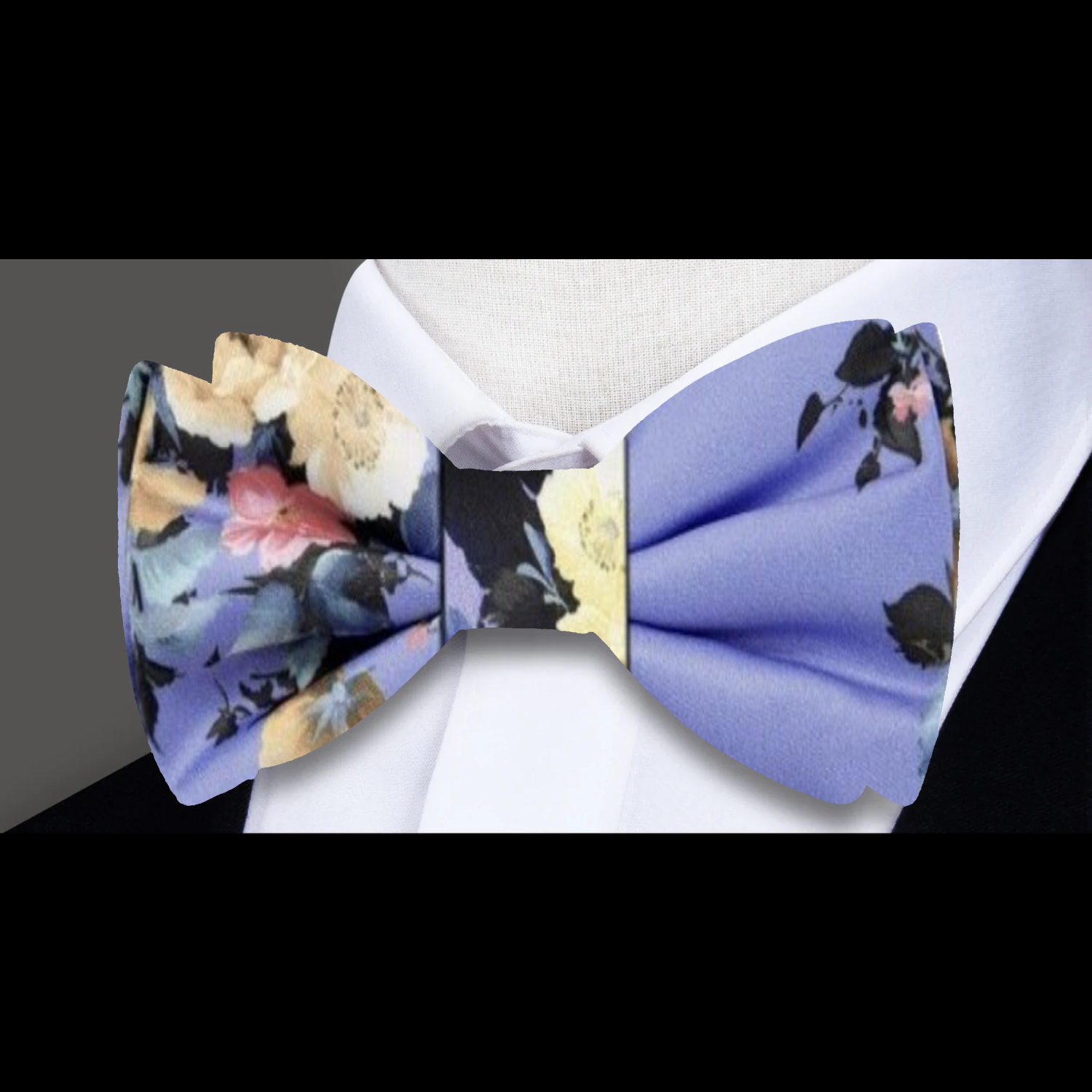 Still life-inspired bow tie styled with lavender shirt and charcoal suit