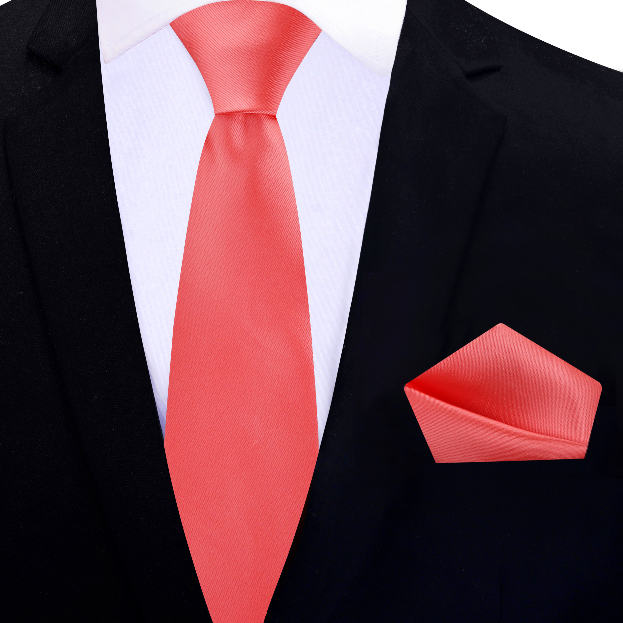Close-up of the luxurious fabric of a coral tie with a refined texture