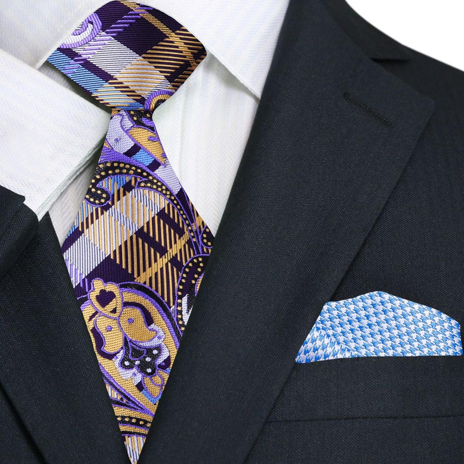 Vibrant paisley necktie styled with a white dress shirt and navy suit.