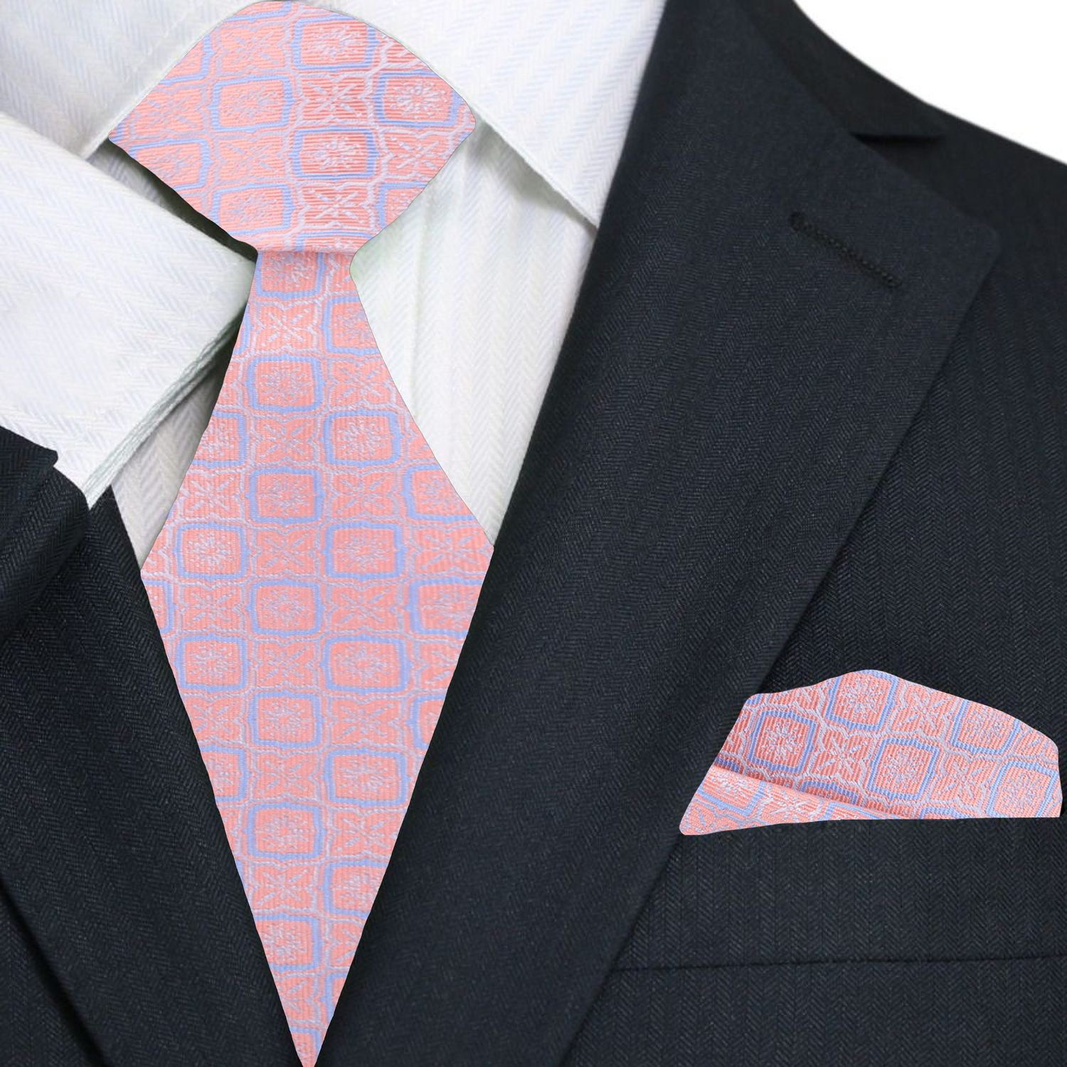 Close-up of geometric pattern silk necktie in peach pink on a display mannequin