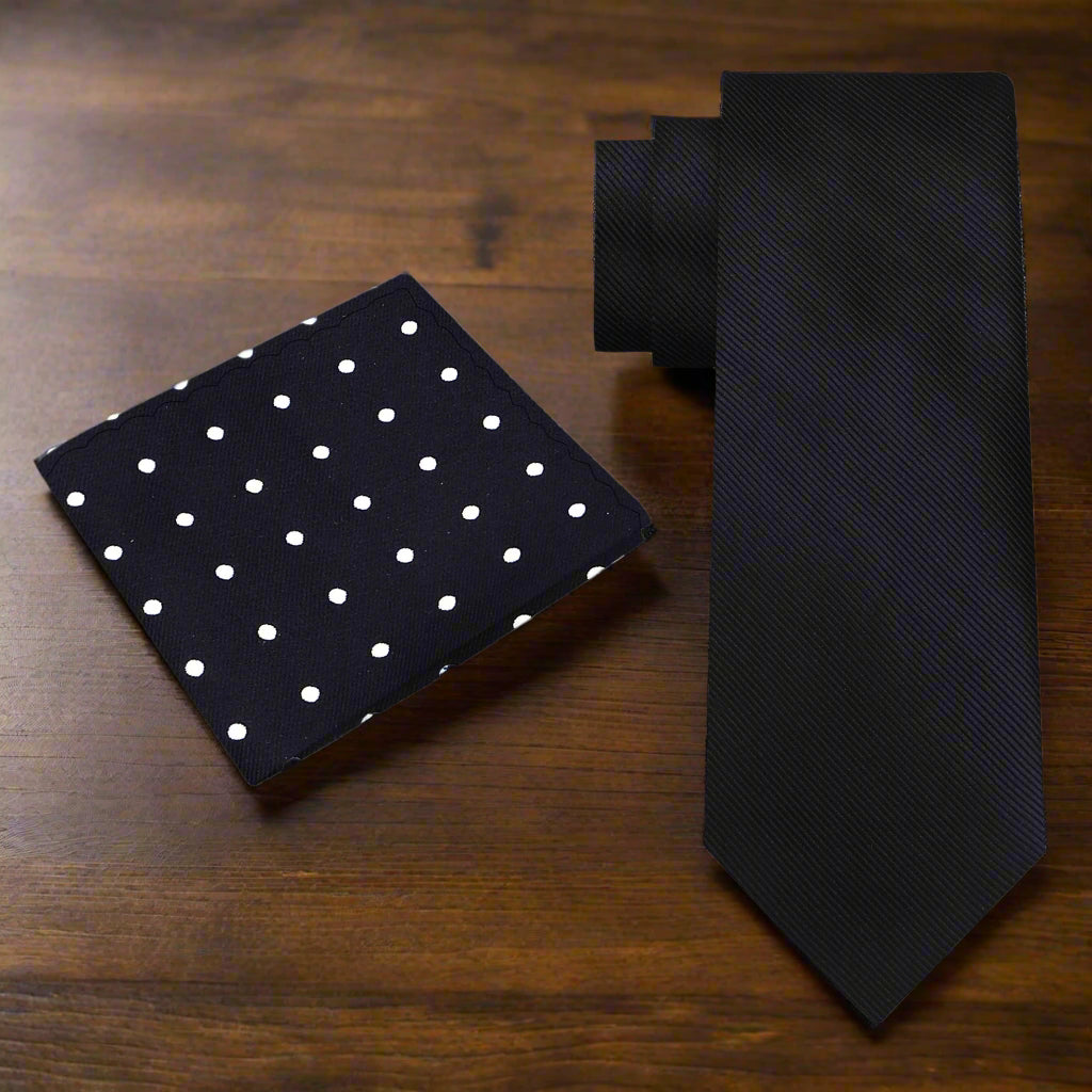 Close-up view of the Elegant Solid Black Silk Necktie showcasing its silky texture and solid design.