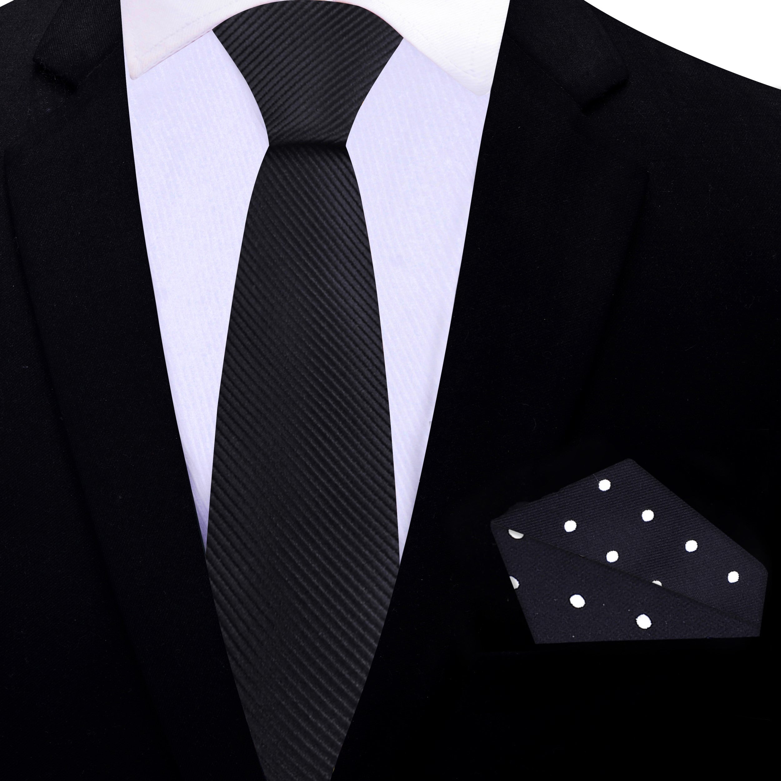 Elegant Solid Black Silk Necktie laid flat next to a pocket square, highlighting its versatility for various outfits.