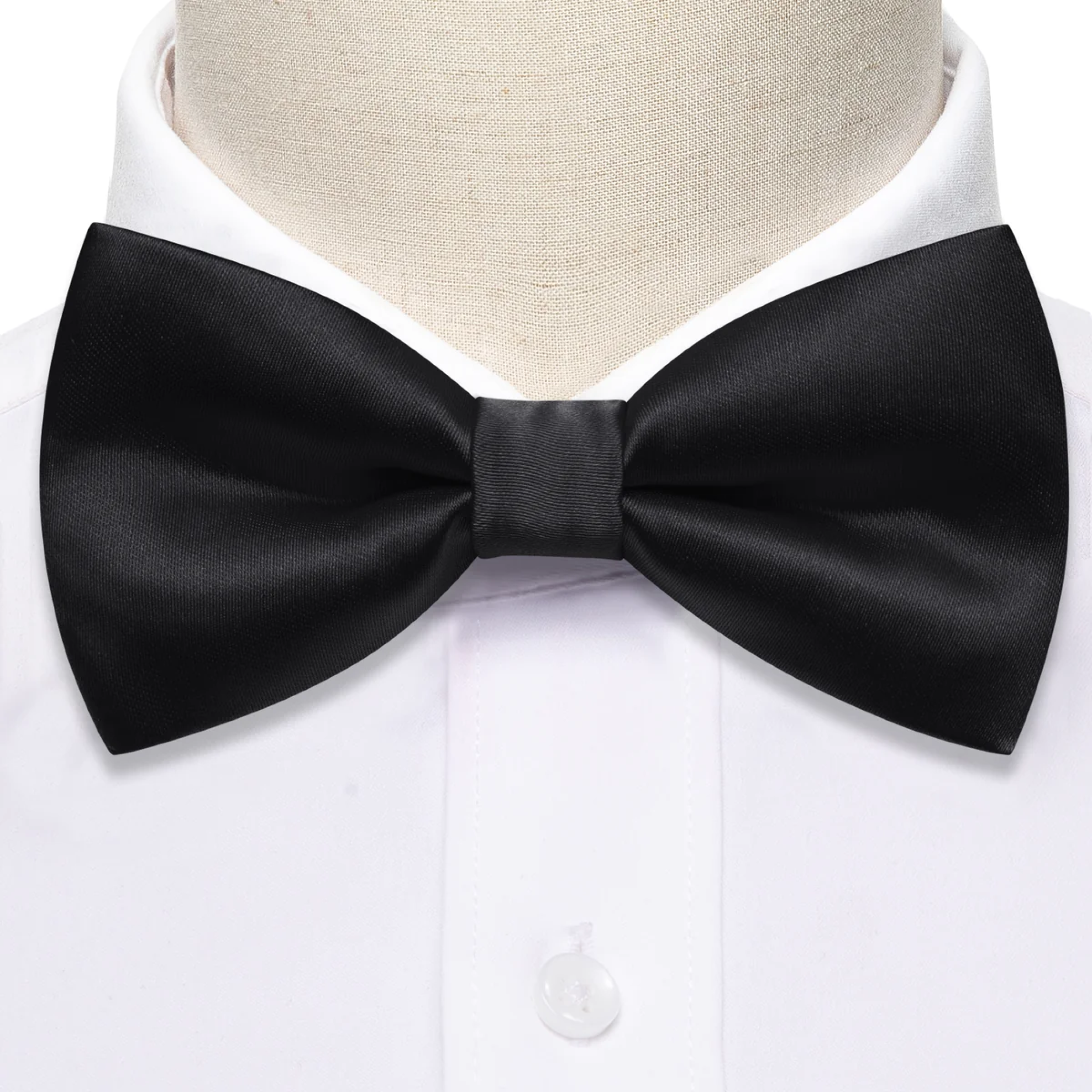 Black pre-tied tuxedo bow tie worn with a classic tuxedo suit