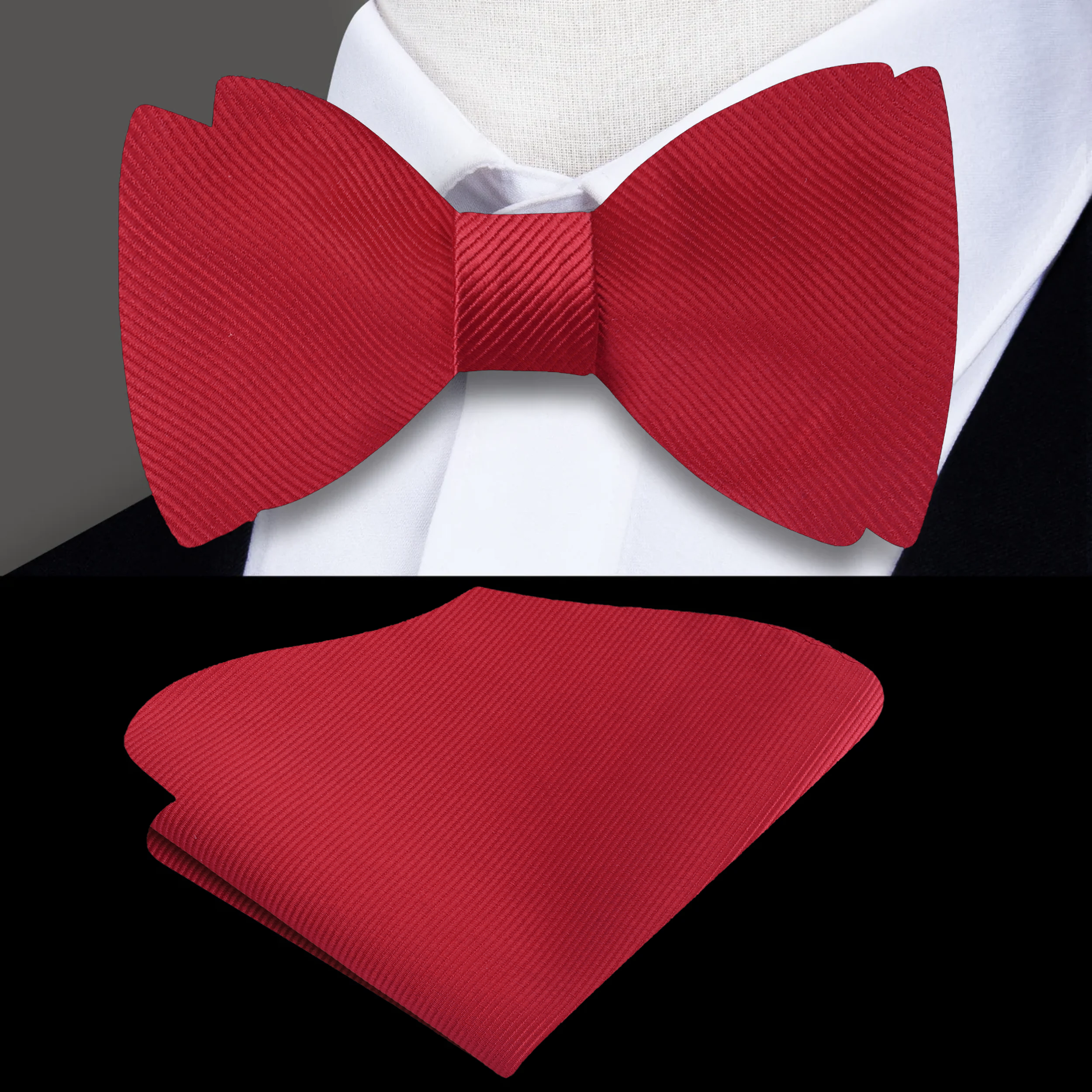 Close-up view of the solid red bow tie with a pocket square, emphasizing the rich silk texture.