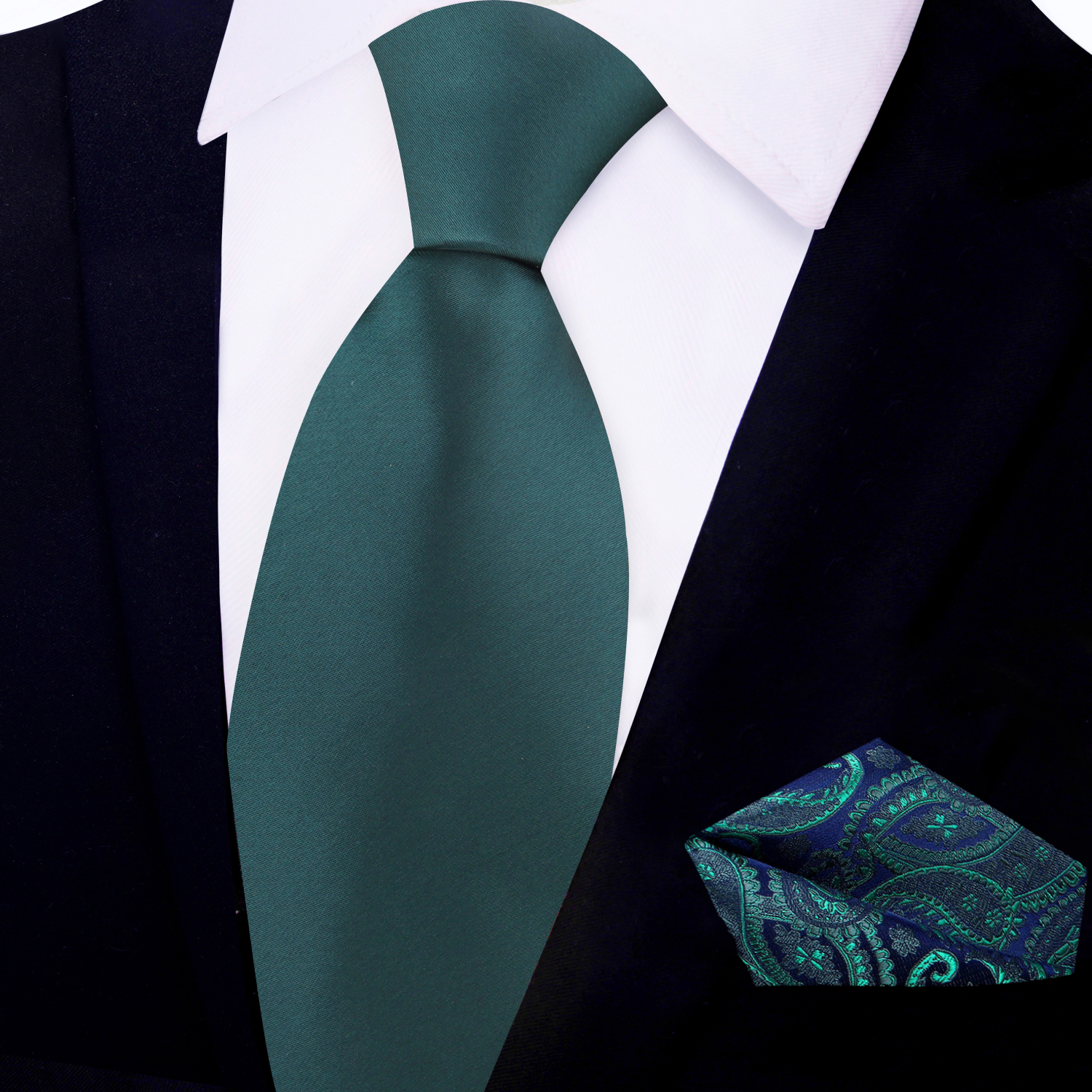 Deep forest green silk necktie displayed on a white shirt for formal wear