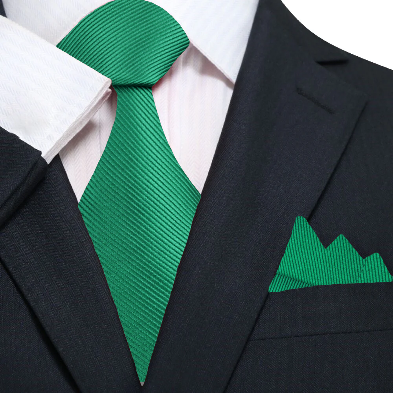Front view of kids green silk necktie with pocket square on a child