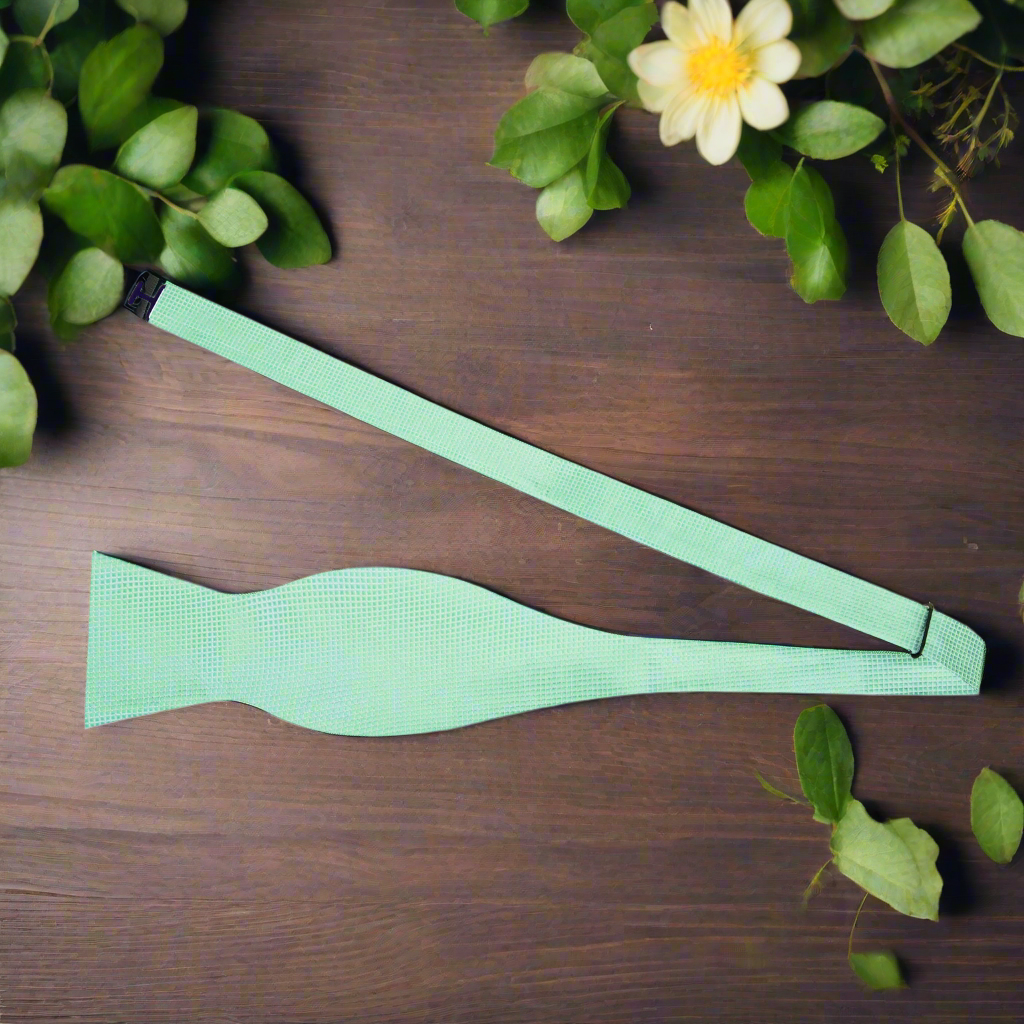 Classic solid color bow tie in royal blue, perfect for formal events.