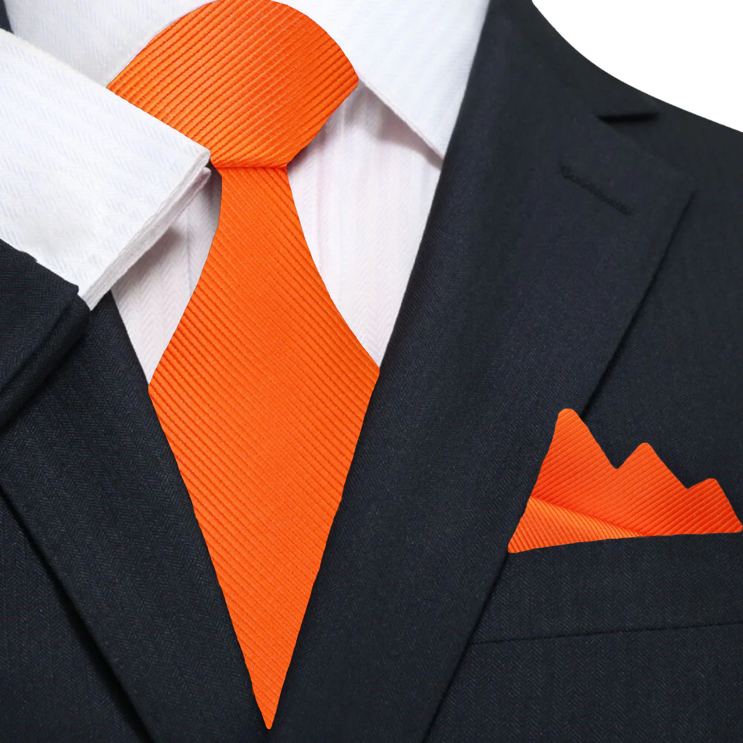 Silk tie in vibrant blue with matching pocket square, perfect for weddings.