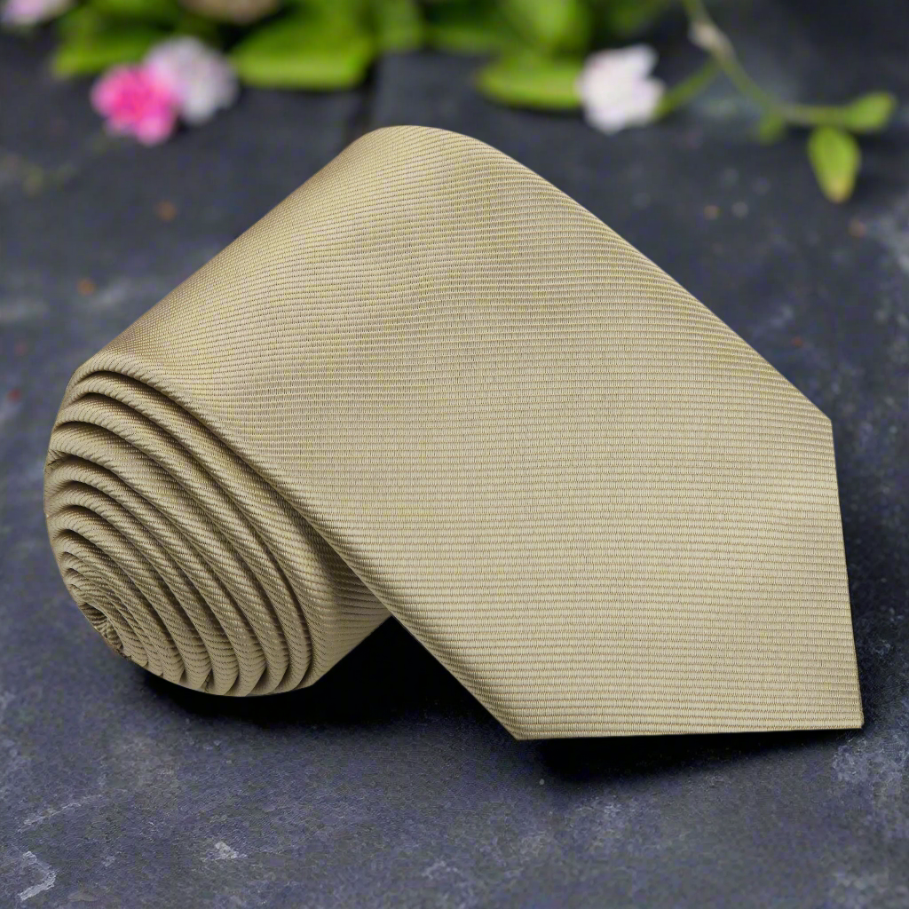 Pale gold silk tie styled with a white dress shirt for a wedding