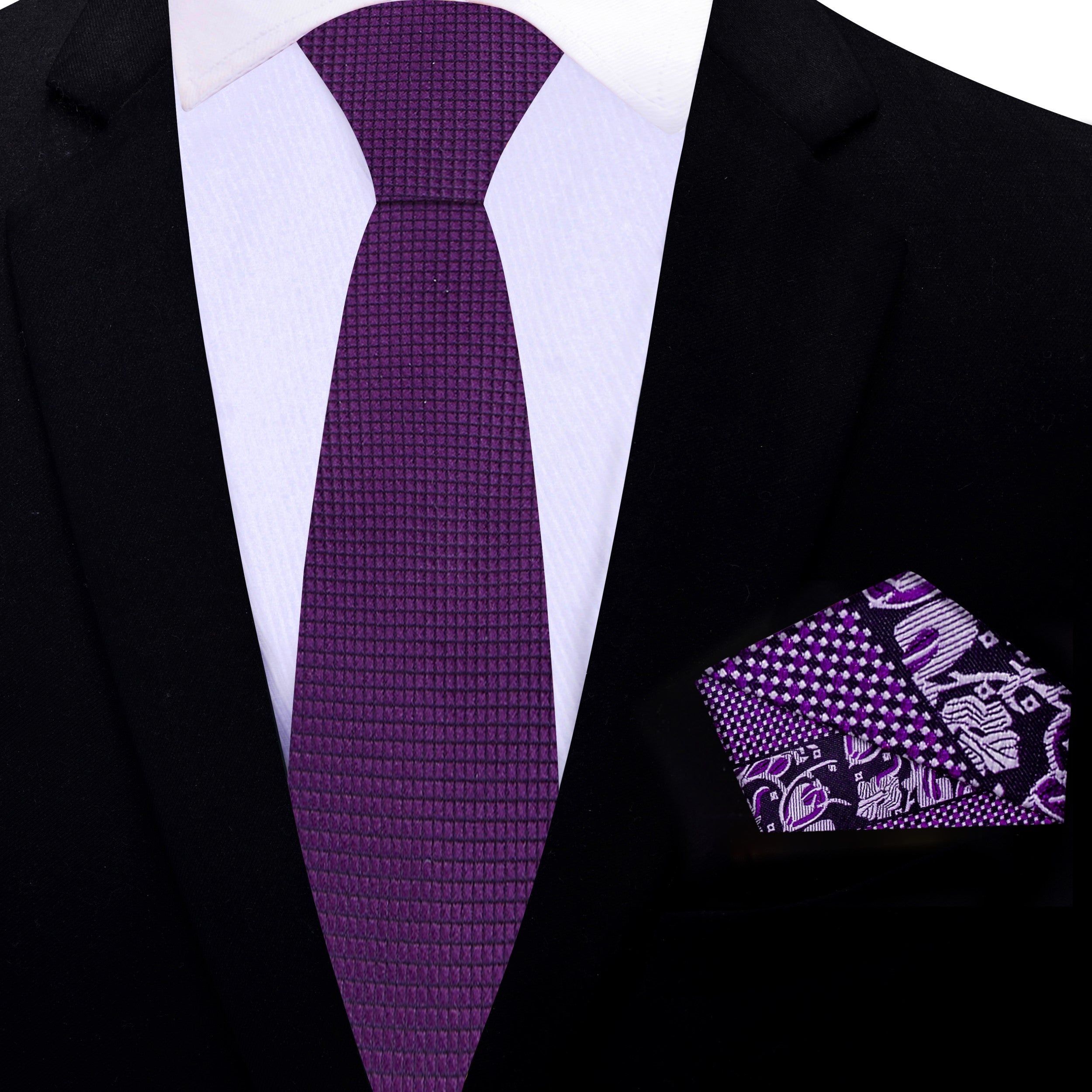 Flat lay of a purple silk tie next to a matching pocket square, ideal for professional attire