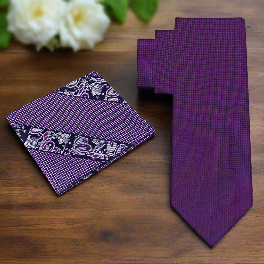 Close-up of a deep purple silk tie showing its smooth texture and rich color, great for office wear