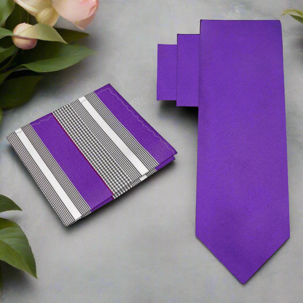 Elegant purple necktie on a hanger, showcasing its rich color and smooth silk texture