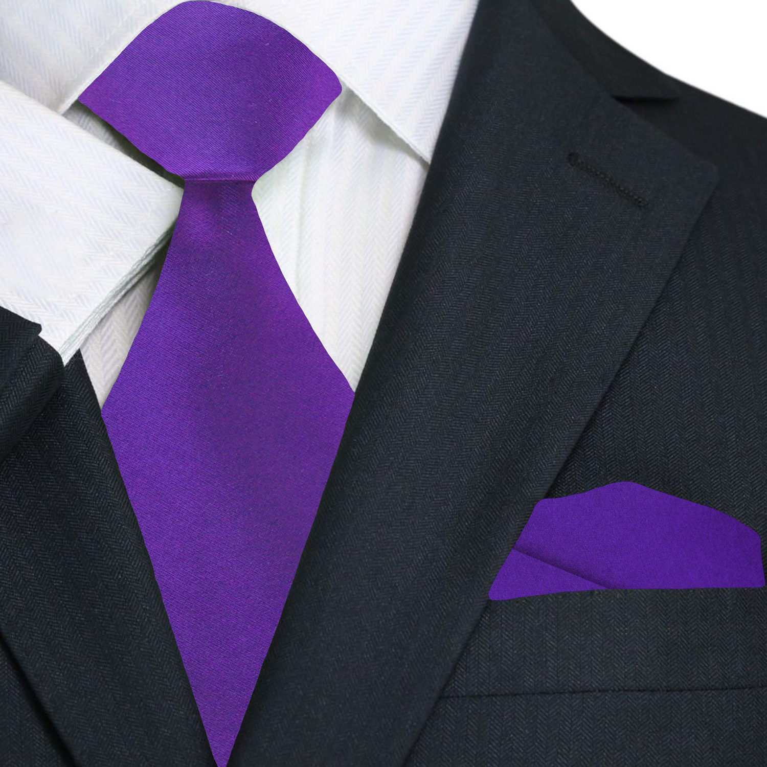 Mens purple silk necktie styled with a white shirt and navy suit for a wedding