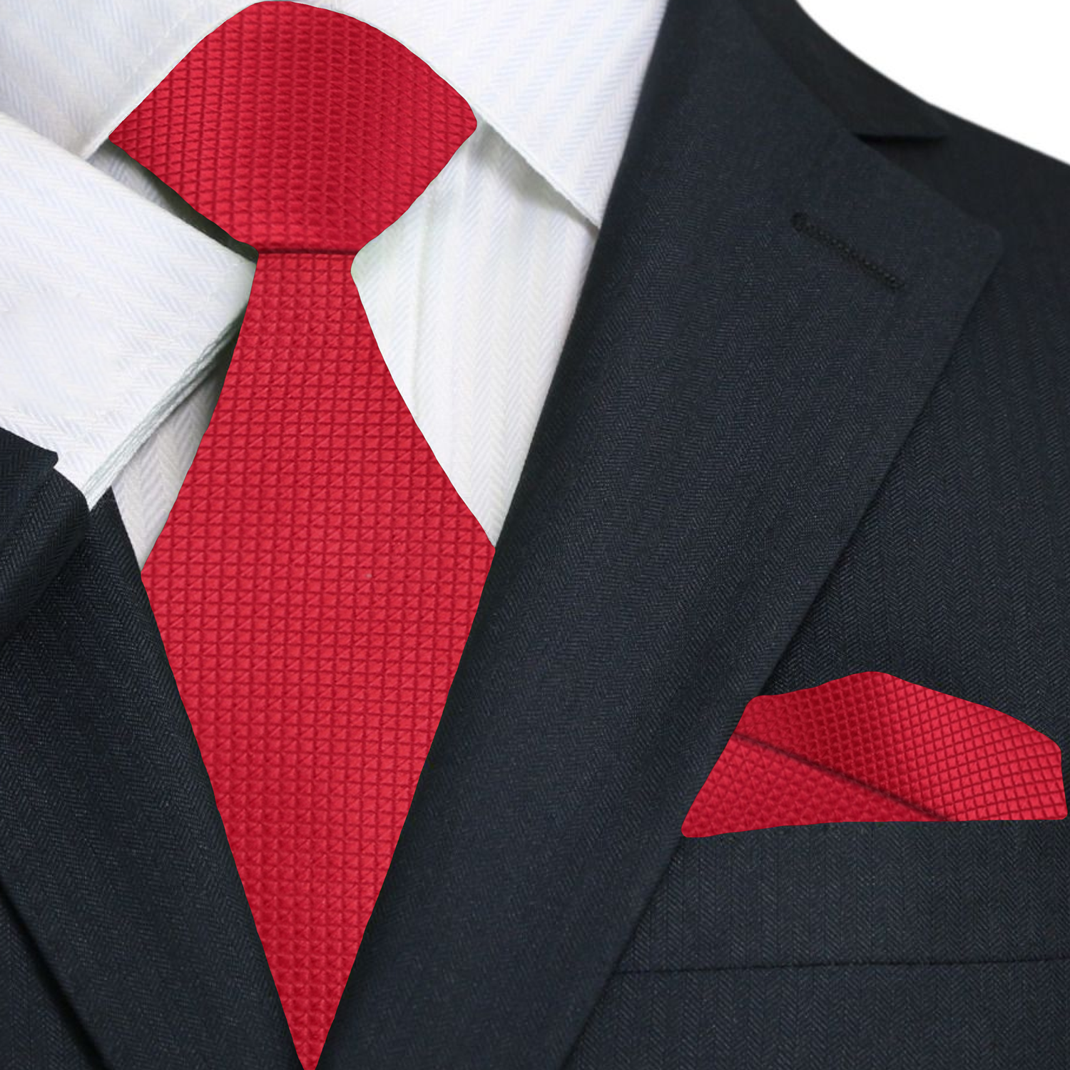 Man wearing a classic solid red mens tie with a white dress shirt and navy suit