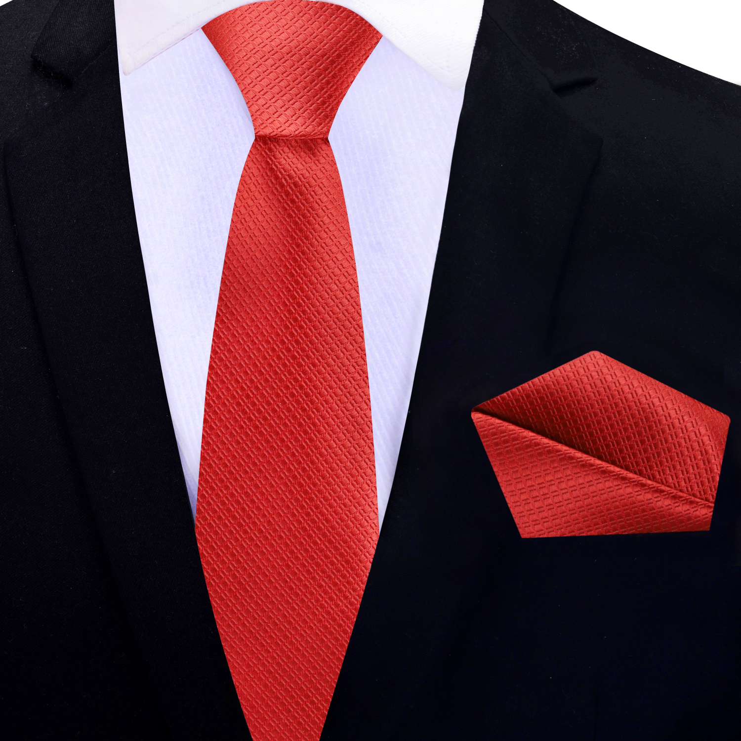Red silk necktie styled with navy suit and white shirt—ideal for weddings
