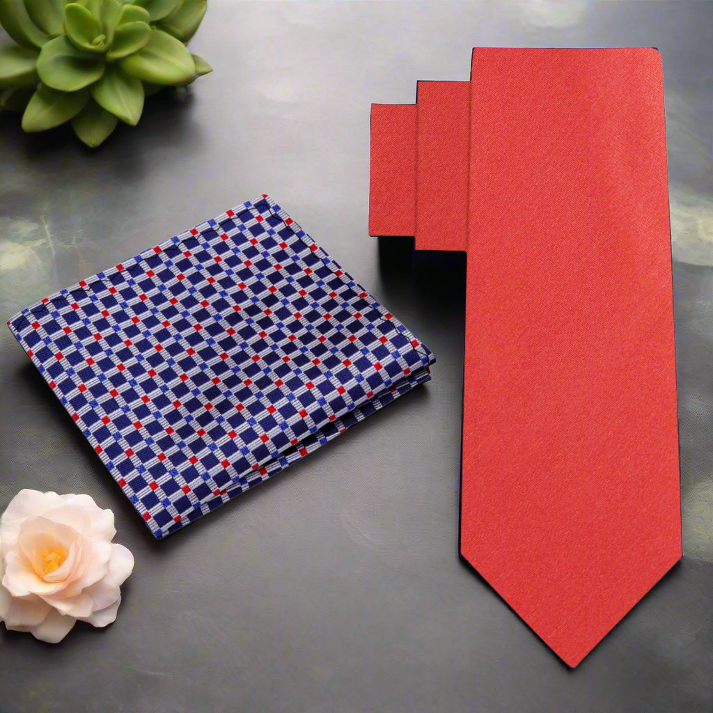 Close-up of Elegant Solid Red Silk Necktie draped over a suit jacket, highlighting its rich texture.