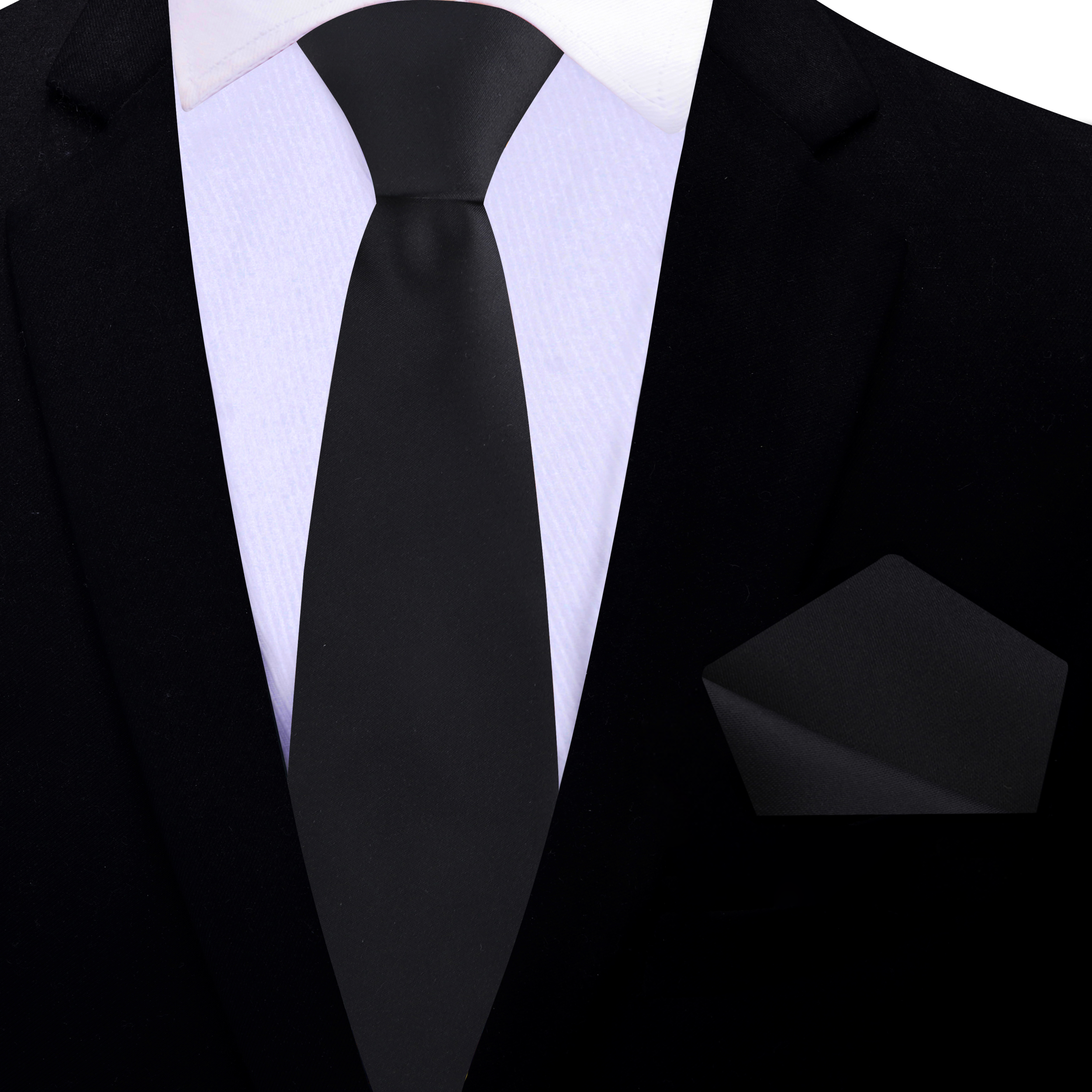 Man wearing a solid black necktie with a suit for a business meeting