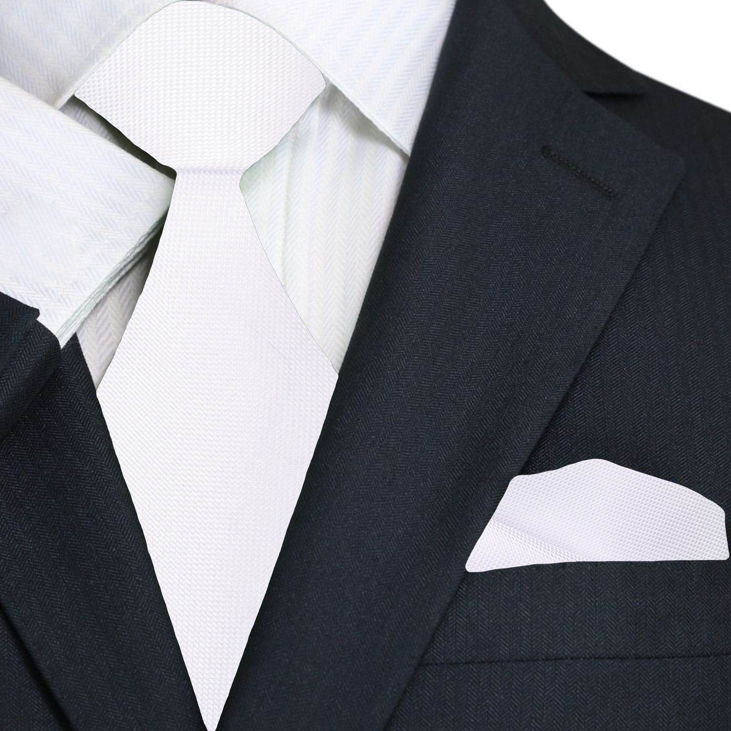Close-up of the solid white necktie showcasing its luxurious silk texture.