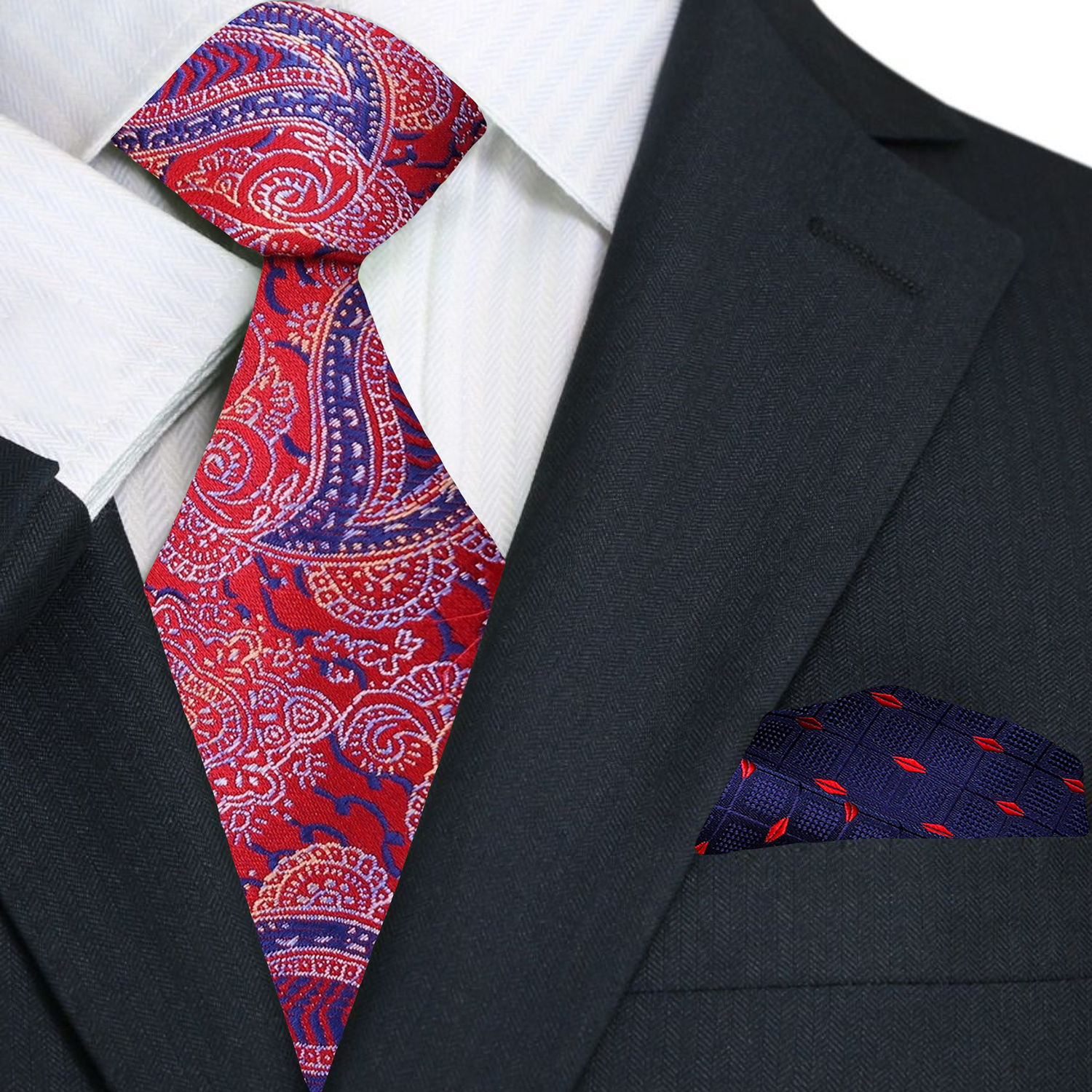 Man wearing a stylish paisley tie with a navy suit for business meetings