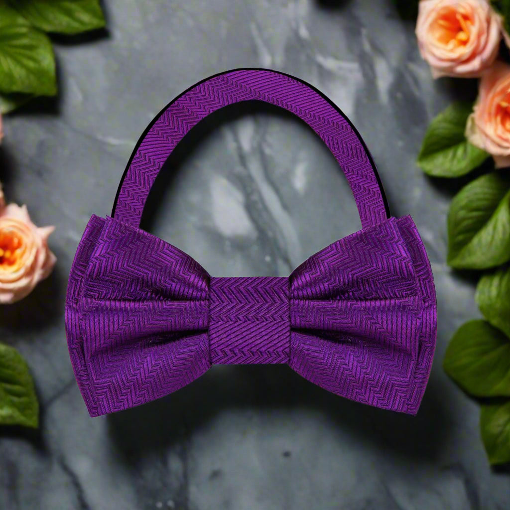 Mens stylish lined texture bow tie in shades of pink and purple for formal events
