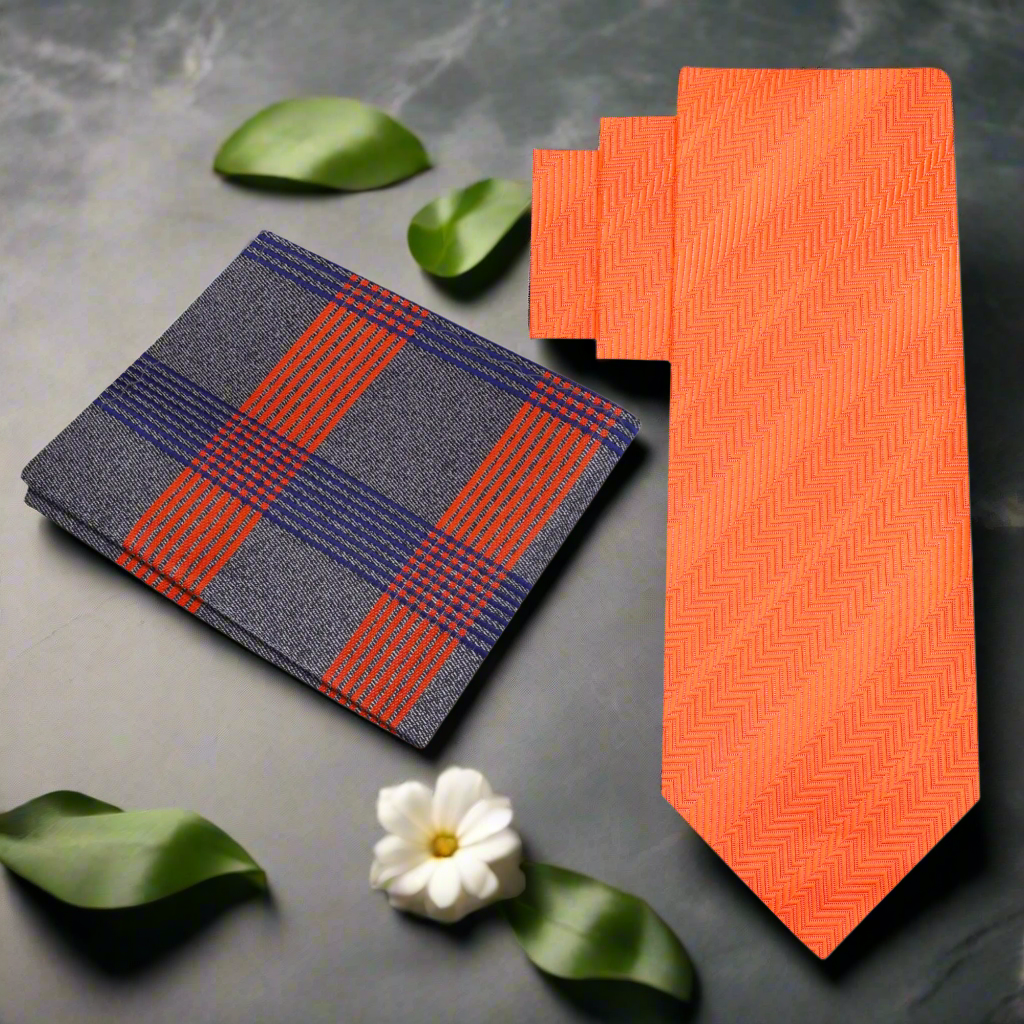 Styled orange tie with navy suit — ideal for business or formal events