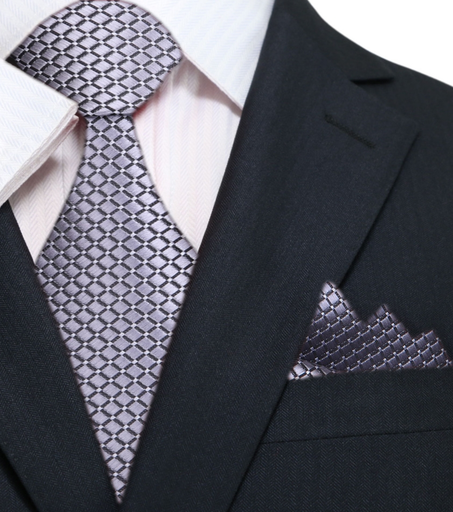 Man wearing a metallic geometric textured silk necktie at a wedding