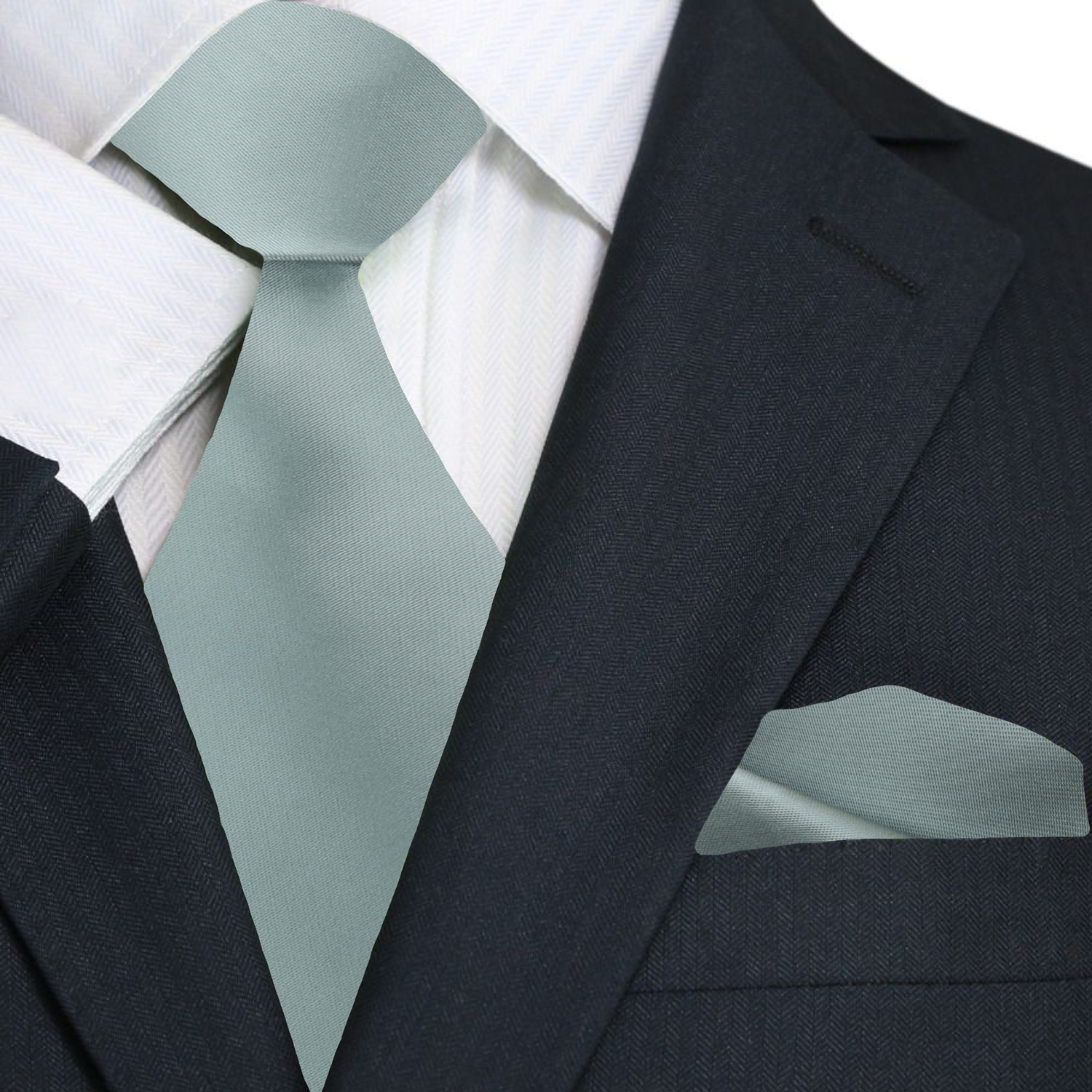 Close-up of a luxurious silk tie in deep navy, highlighting its fine craftsmanship and sheen.