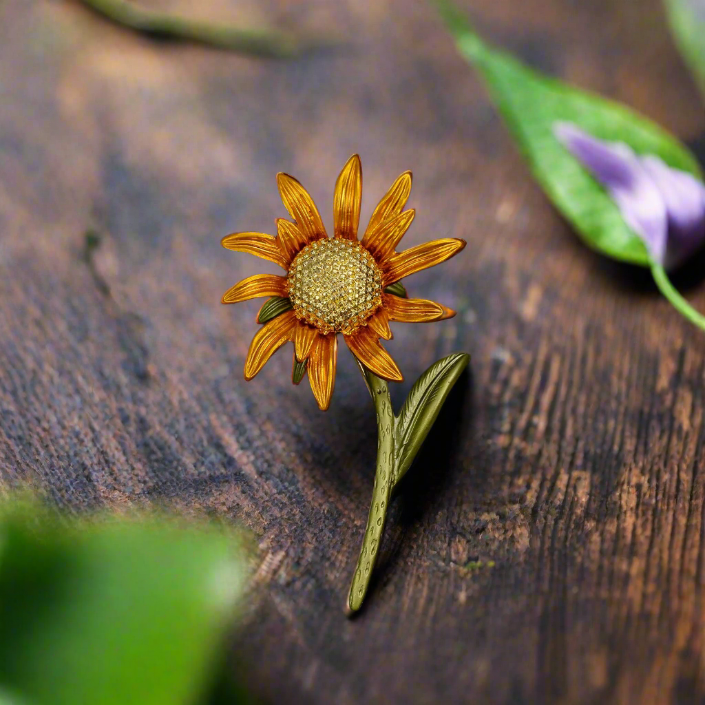 Radiant sunflower dress pin showcased on a light blue dress shirt.