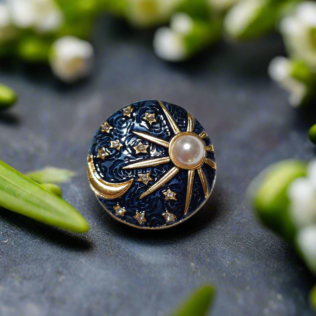 Close-up of the Celestial Sun, Moon & Stars Lapel Pin showcasing its intricate design and colors.