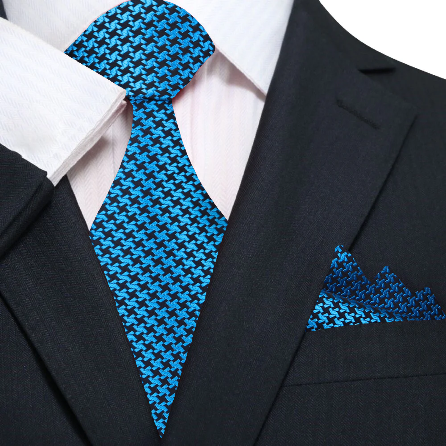 Matching pocket square in gold and black houndstooth design complementing the necktie