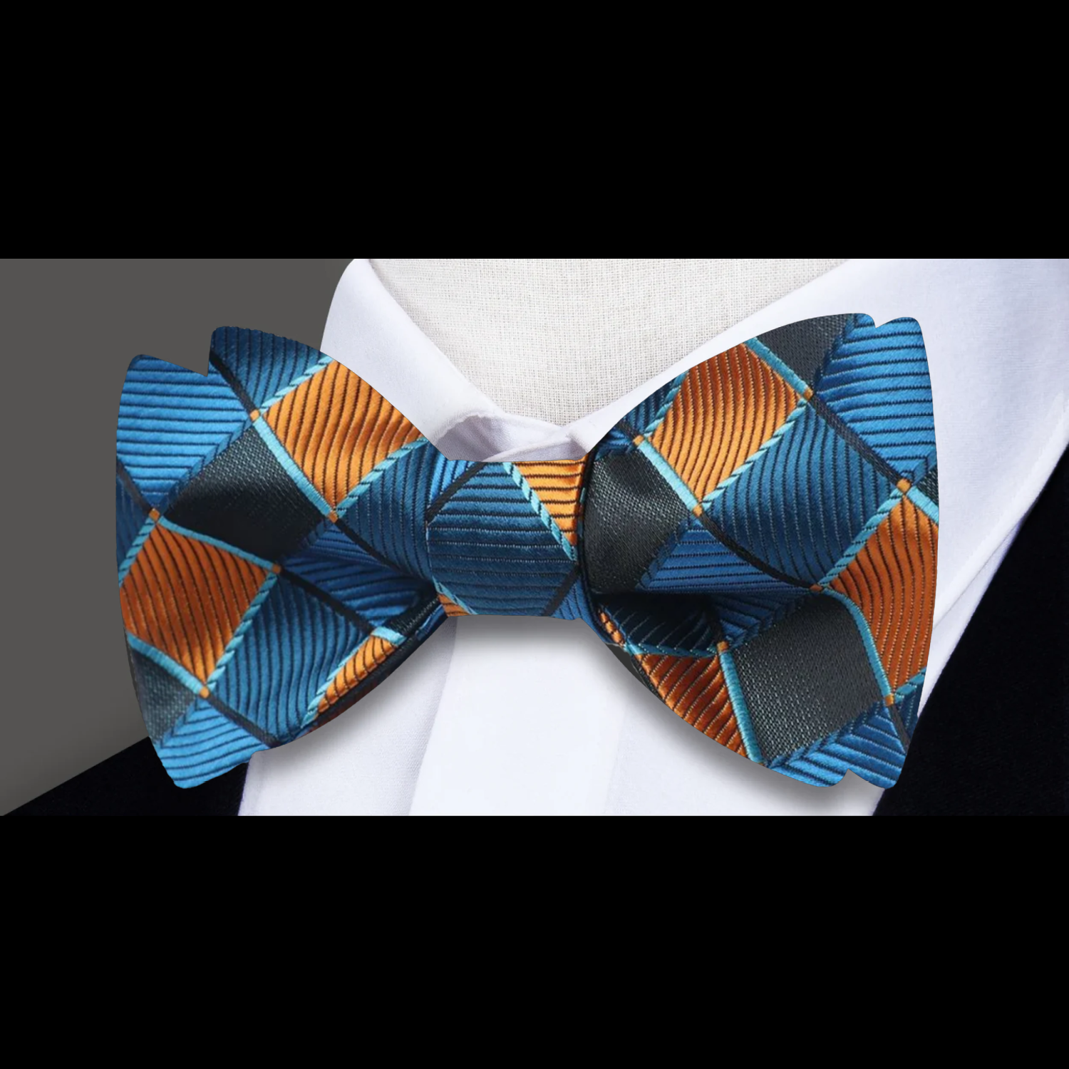 Close-up of matching pocket square with geometric pattern
