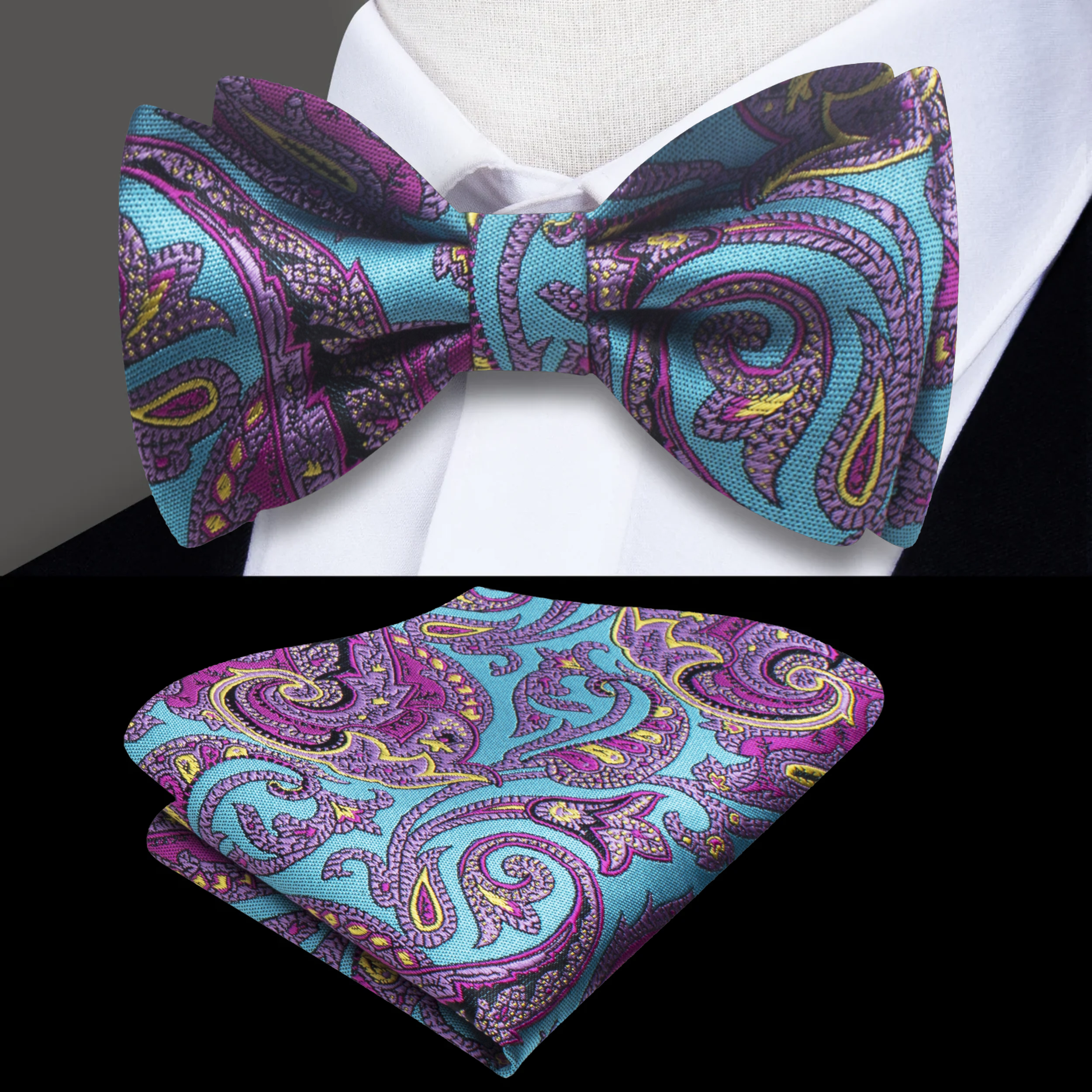 Close-up of a vibrant silk paisley bow tie in blue and yellow with detailed pattern