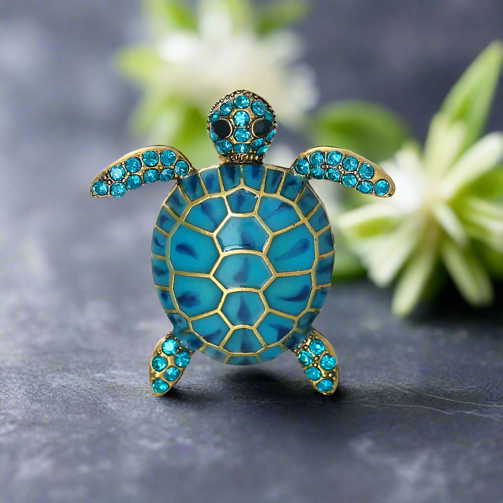 Stylish sea turtle lapel pin in teal enamel on a dress shirt