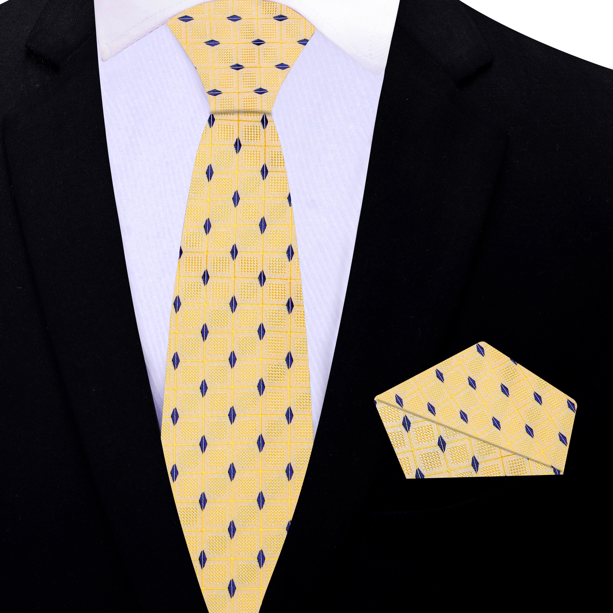 Golden blue silk tie paired with a white dress shirt and navy suit, offering a sophisticated look.
