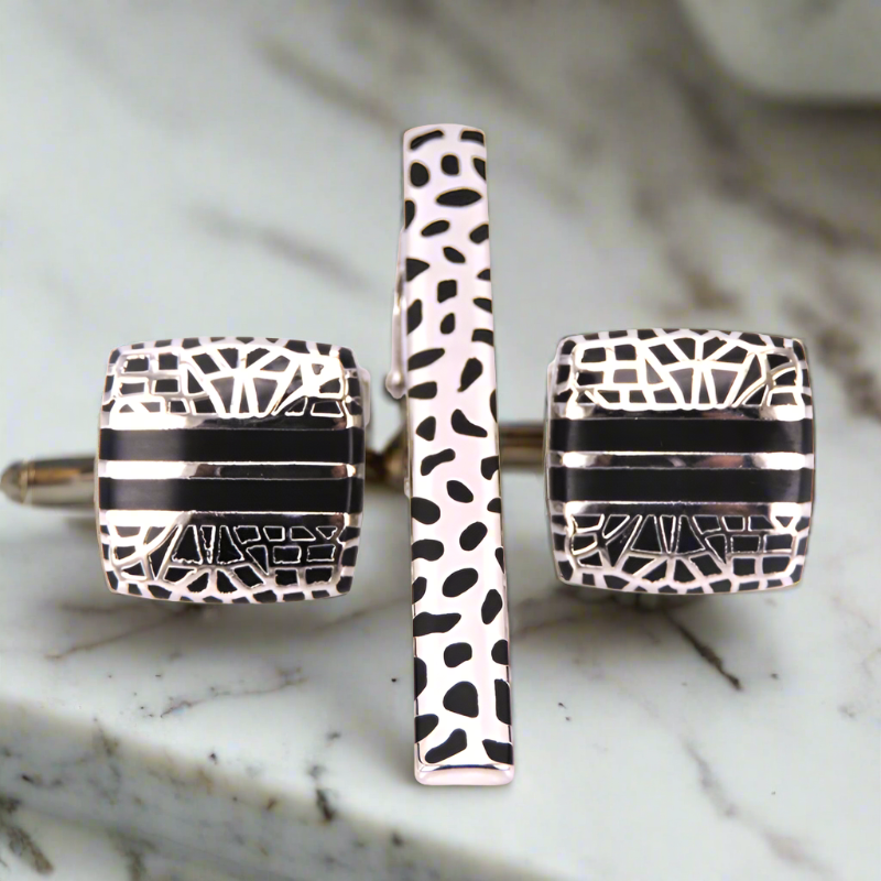 Elegant mens jewelry featuring cuff links and tie bar, perfect for business attire