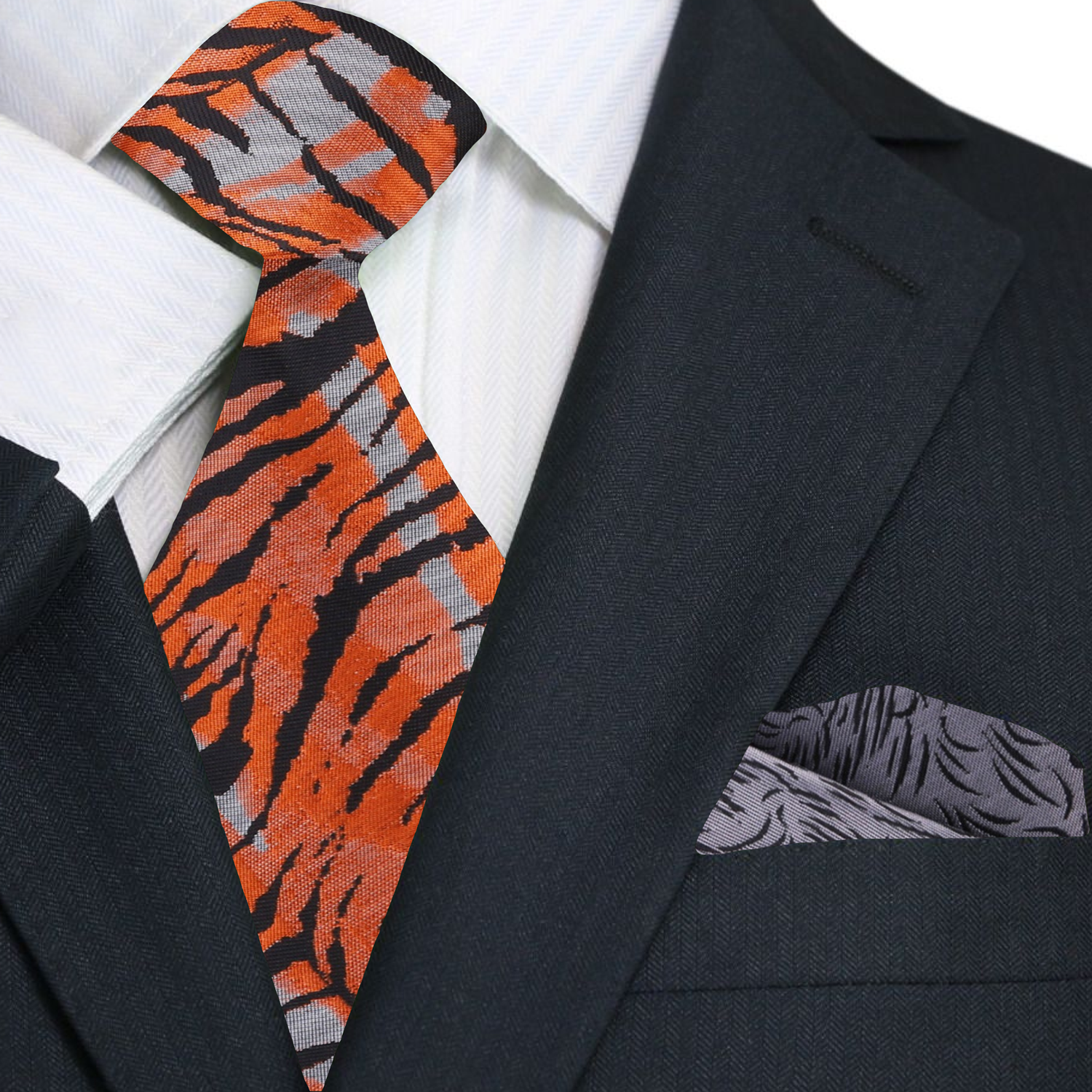 Stylish close-up of the tiger print silk tie paired with a white dress shirt, highlighting its elegant design.
