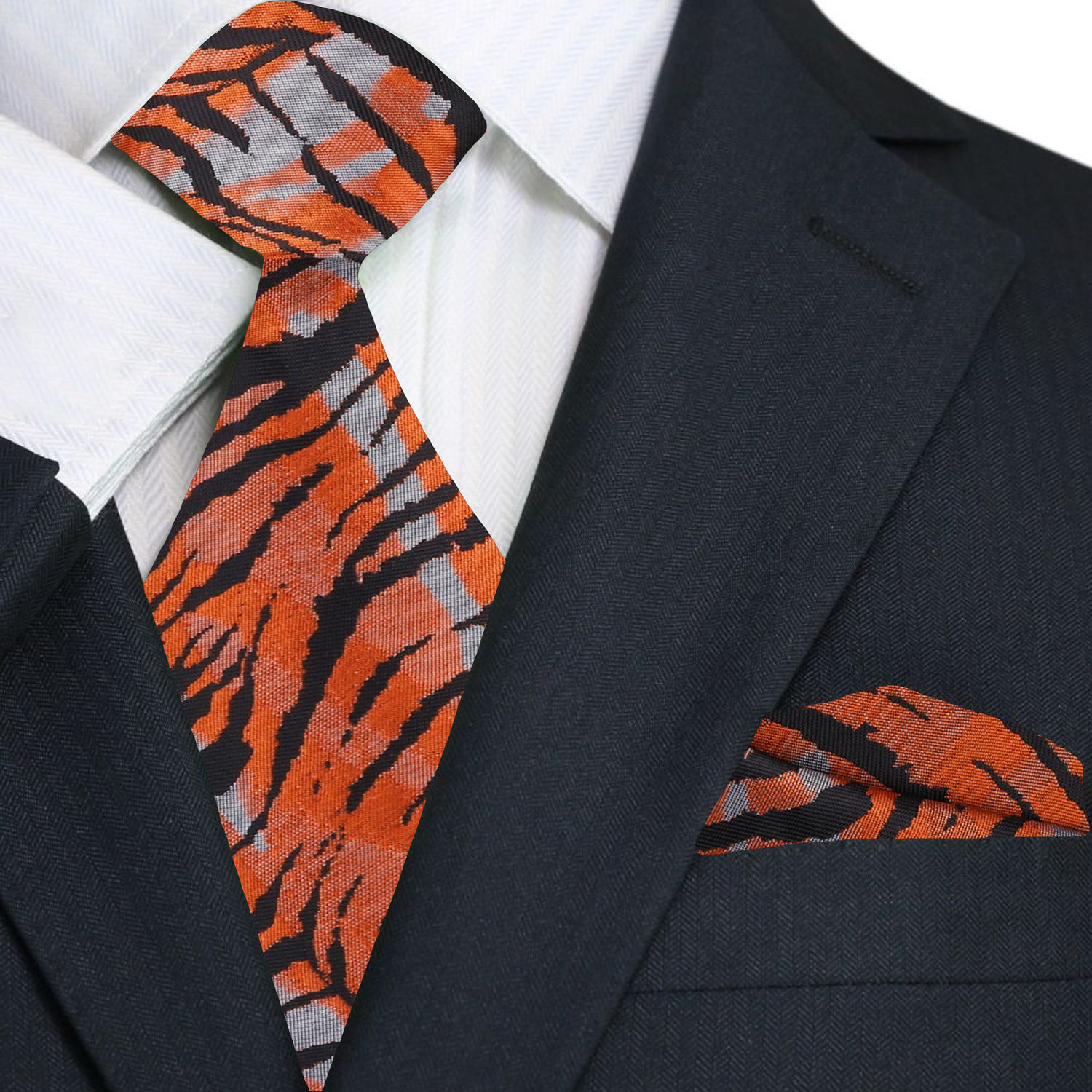 Stylish close-up of the tiger print silk tie paired with a white dress shirt, highlighting its elegant design.