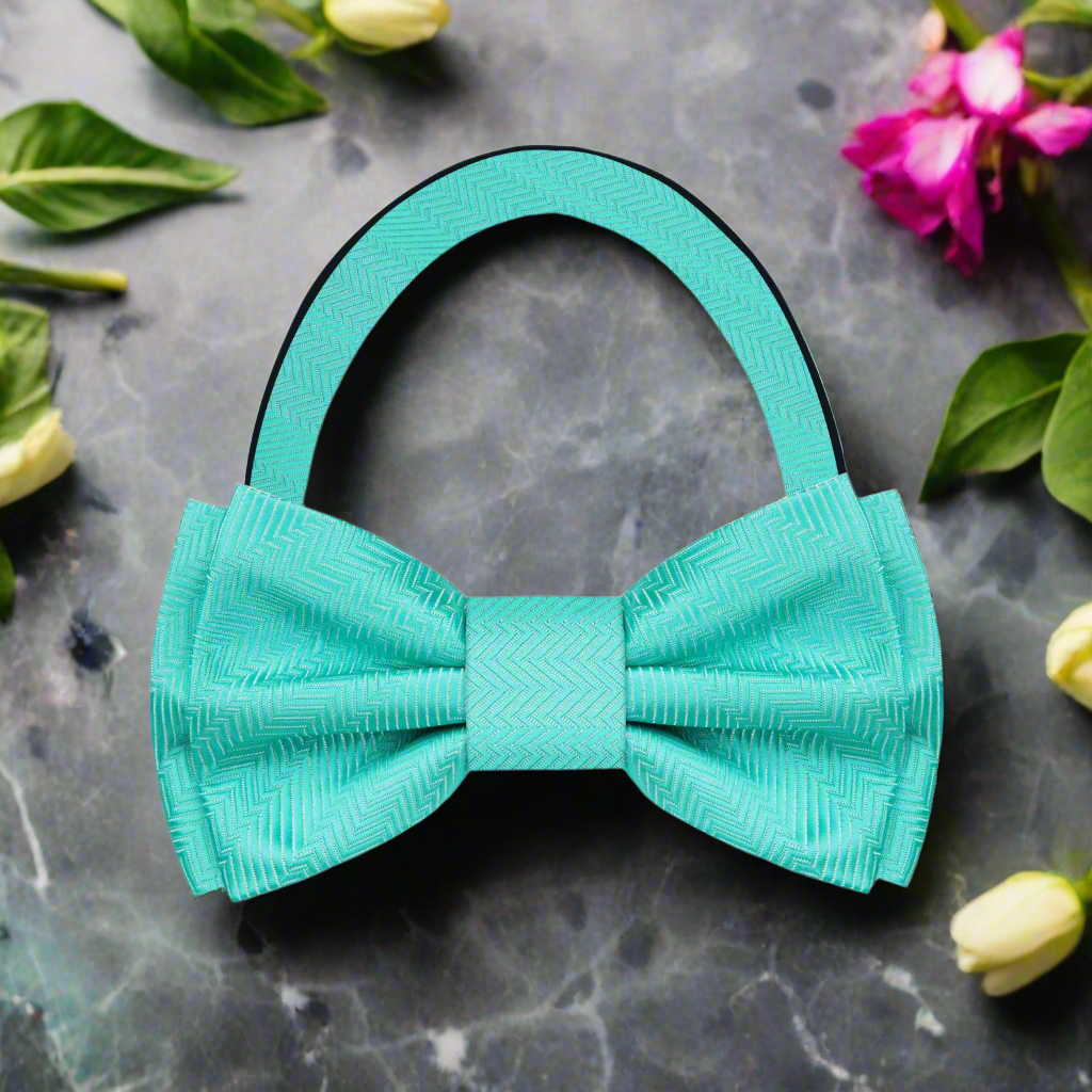 Flat lay of bow tie and pocket square set in vibrant Electric Blue