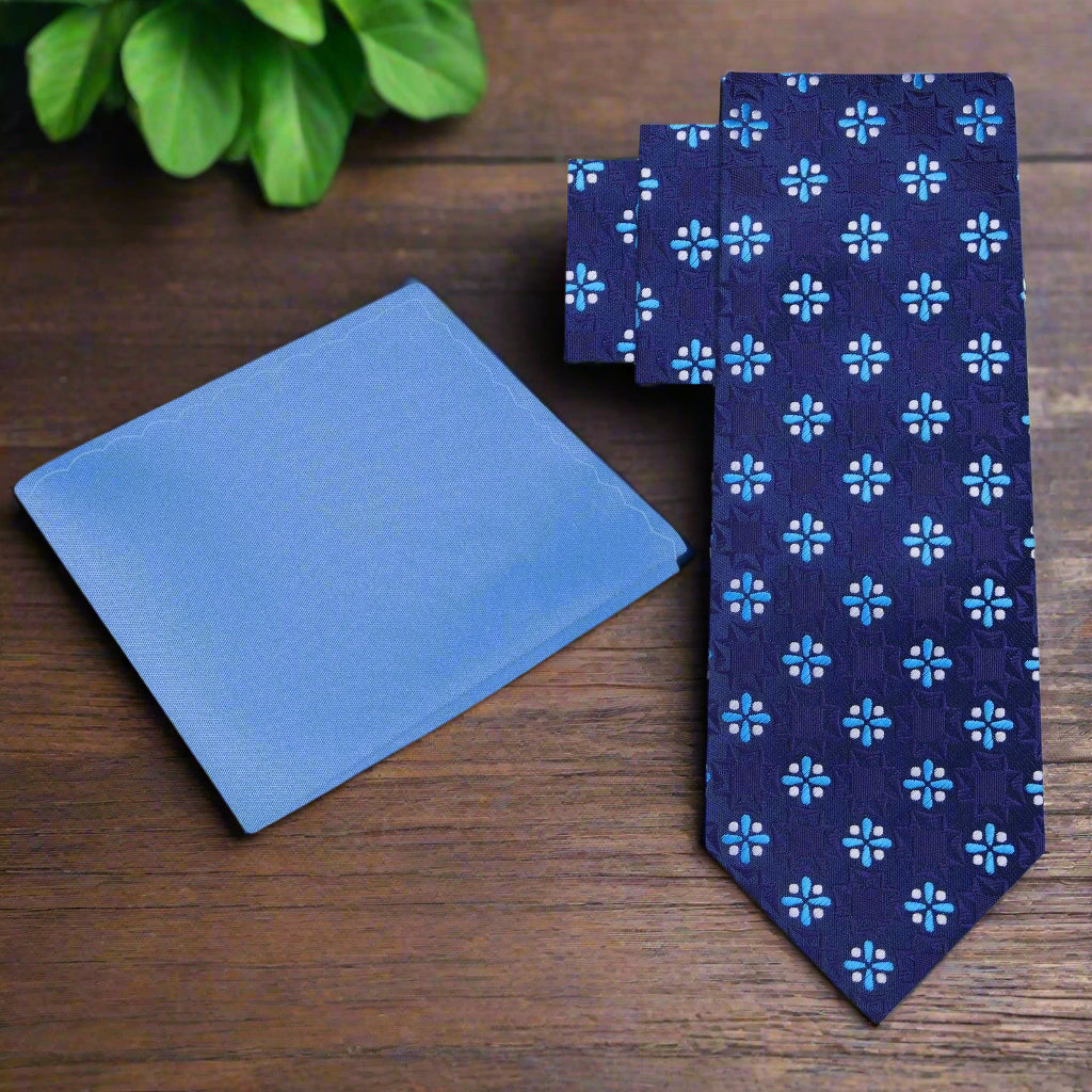 Elegant dark blue silk necktie with light blue medallions, ideal for weddings