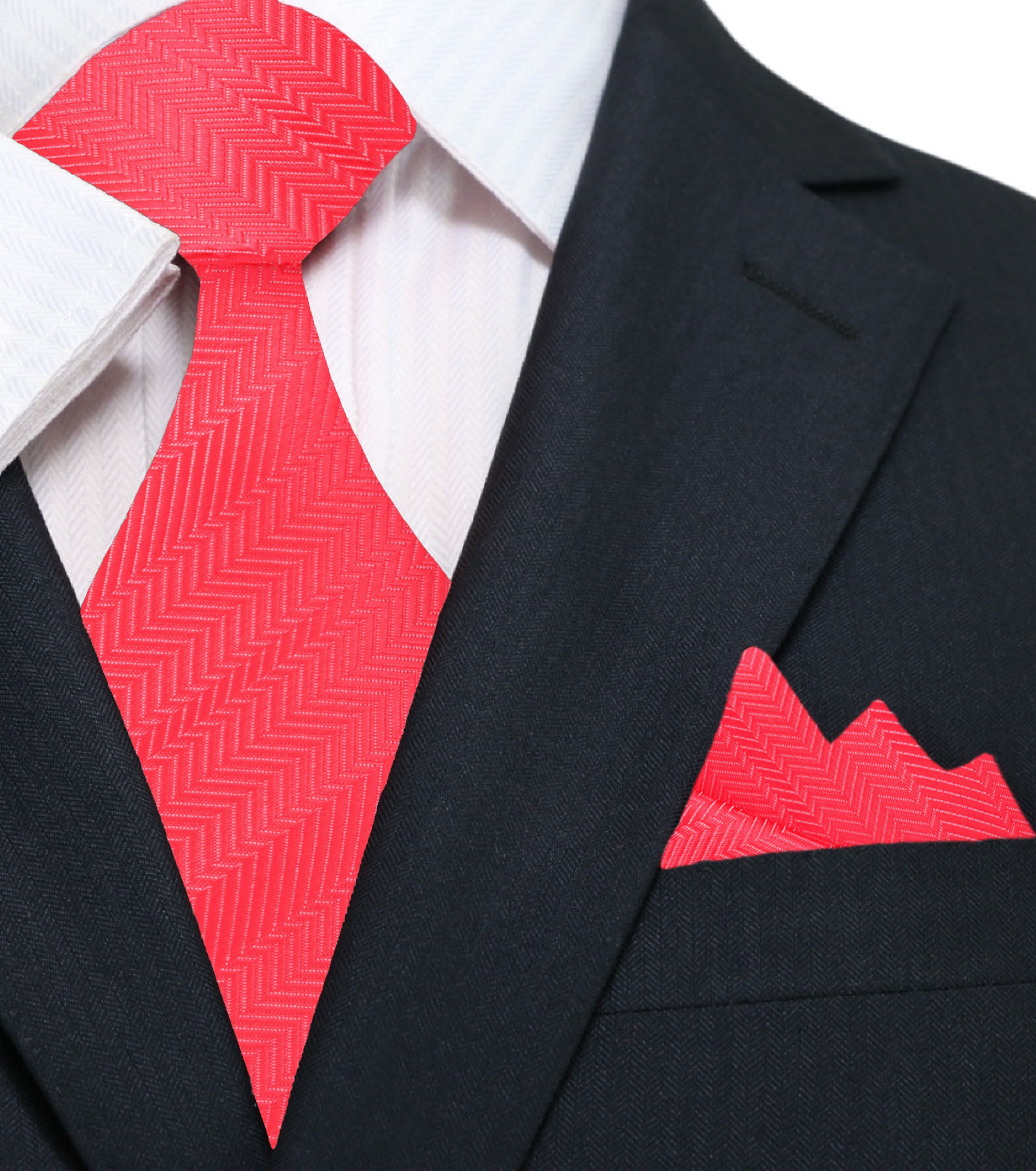 Model wearing the red textured silk tie with a navy suit at a corporate event.