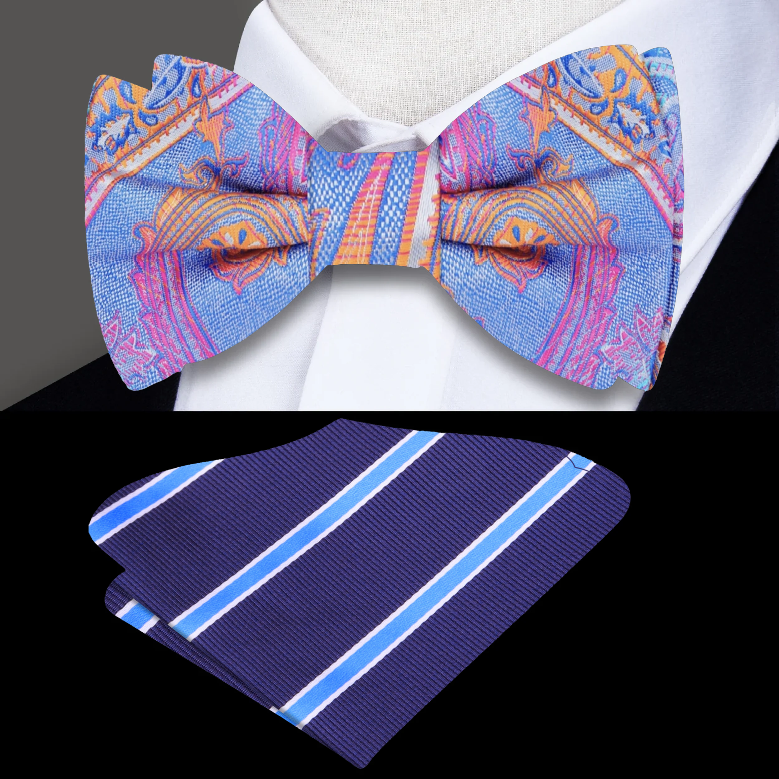 Close-up of the light blue paisley bow tie showcasing intricate pink, purple, and orange patterns.