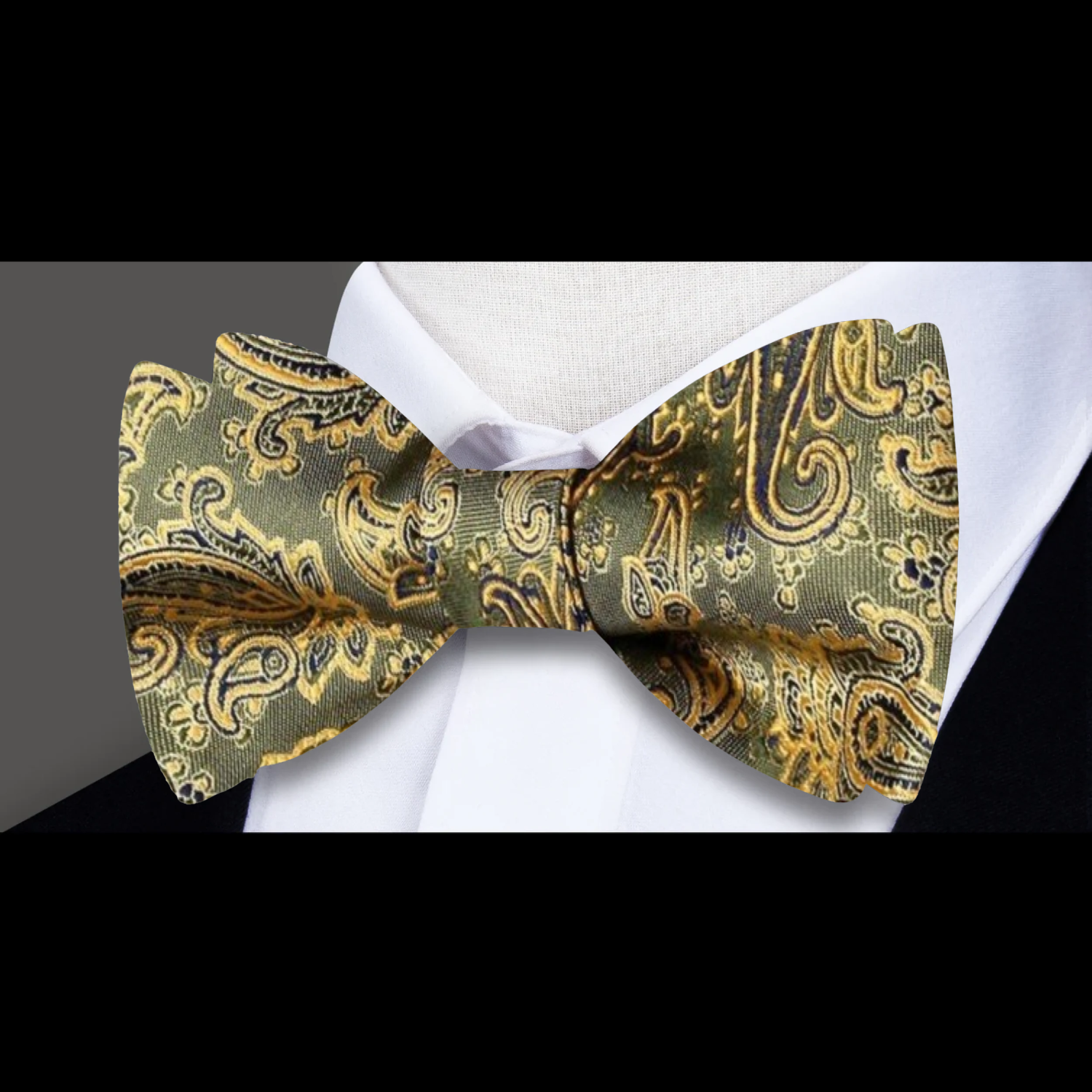 Self tie bow tie displayed against a crisp white dress shirt, highlighting its intricate design.