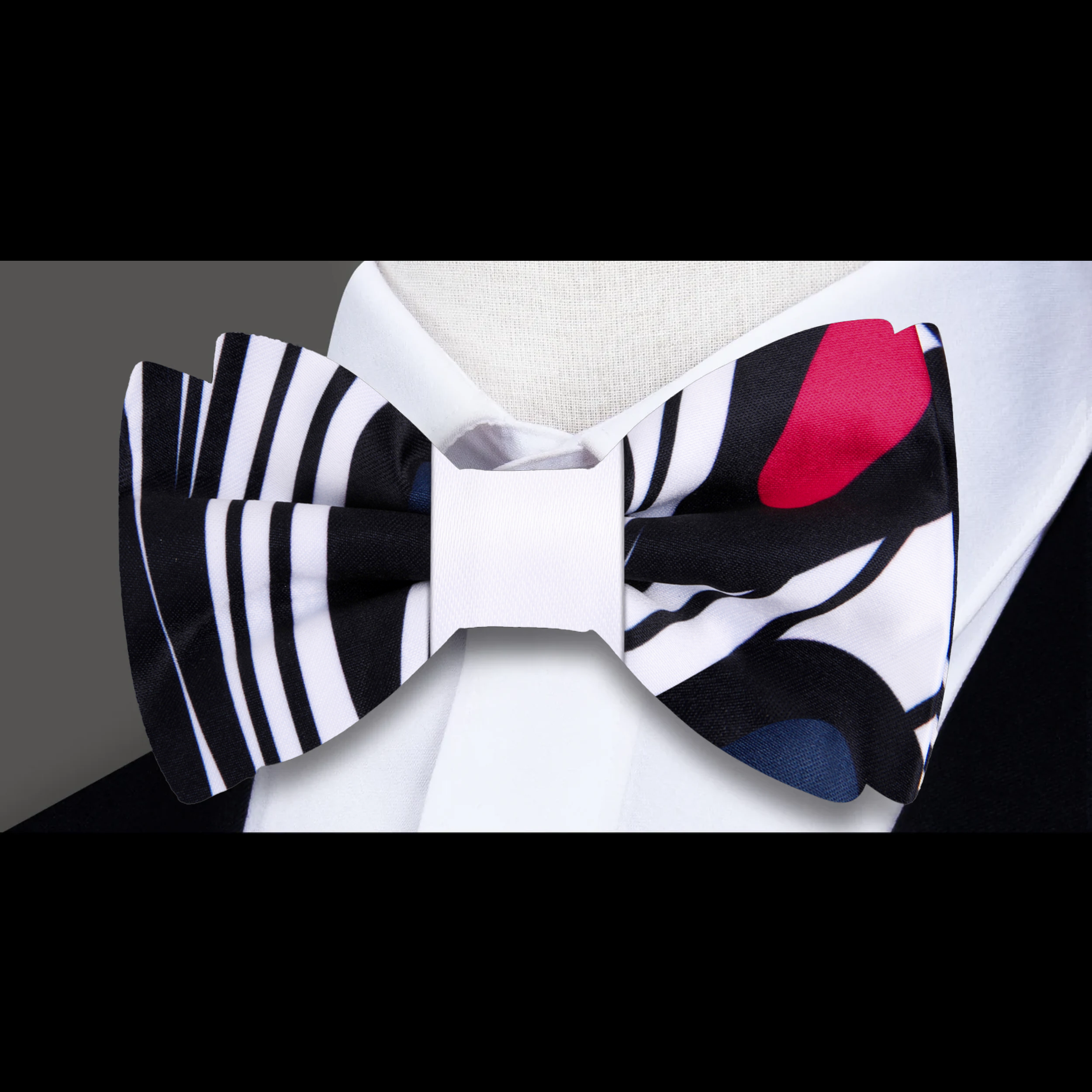 Close-up of the elegant paisley bow tie showcasing its intricate pattern and colors.