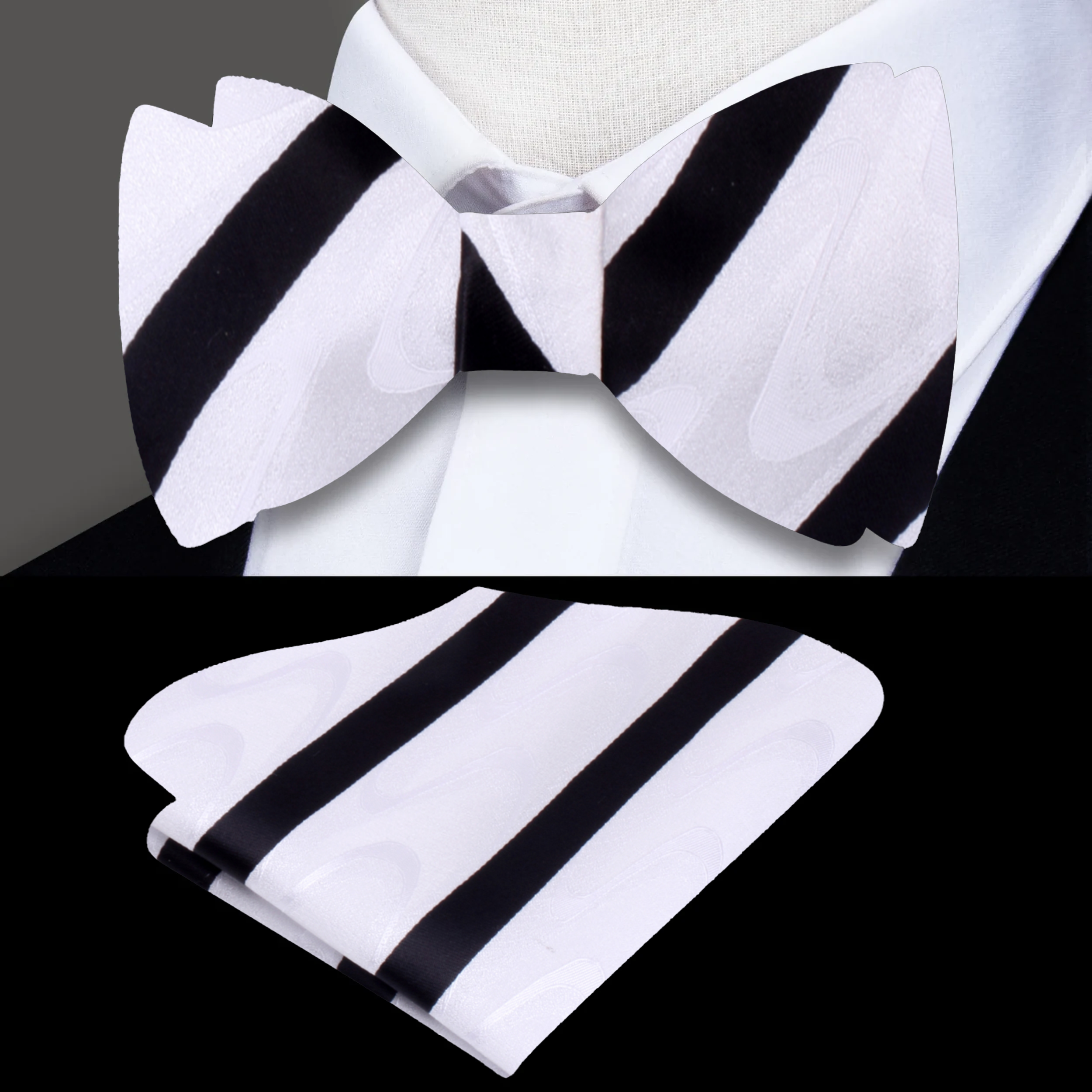 Close-up of black and grey silk bow tie with wavy pattern